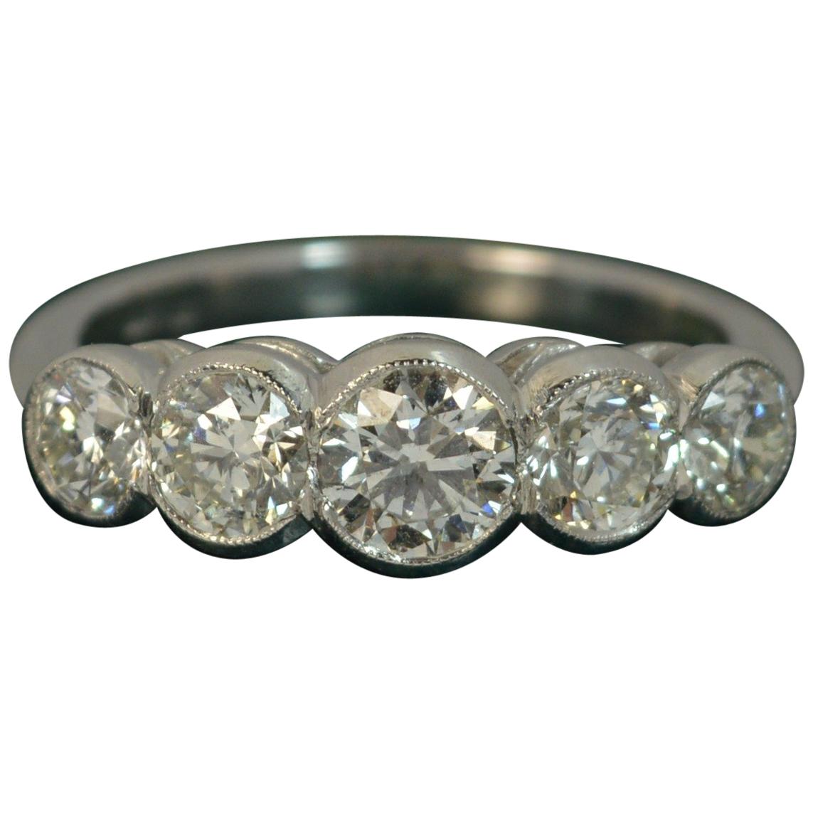 Beautiful 1.75 Carat Diamond Five-Stone Platinum Bezel Set Stack Ring