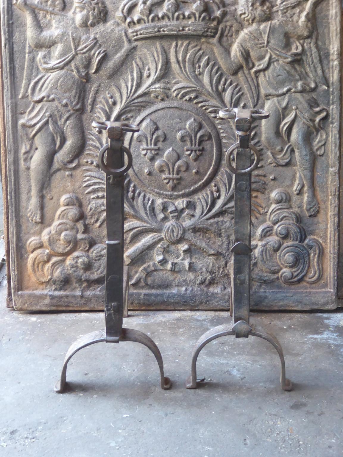 Beautiful 17th century French Gothic andirons made of wrought iron. The tops of the andirons have the shape of bull heads, which is characteristic for this type of andirons. In France they are called 'landiers'.







