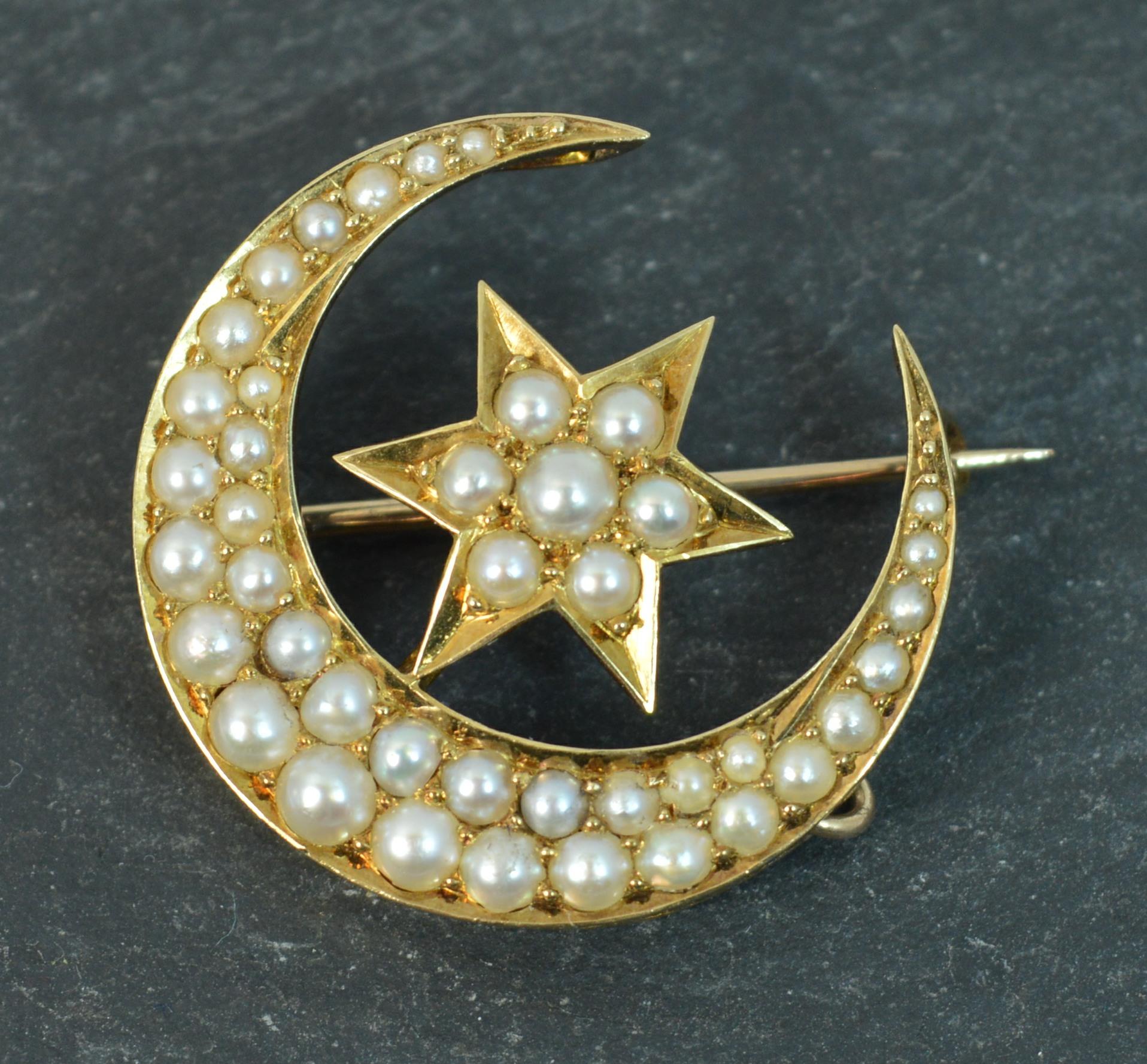 A late Victorian period example in 18 carat gold.

18ct yellow gold example of crescent moon shape with star to the centre. Each encrusted with many seed pearls.

c1880.

Currently a brooch but can be made into a pendant too.

CONDITION ; Excellent.