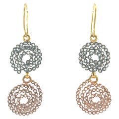 Beautiful 18-Kt gold and silver diamond earrings