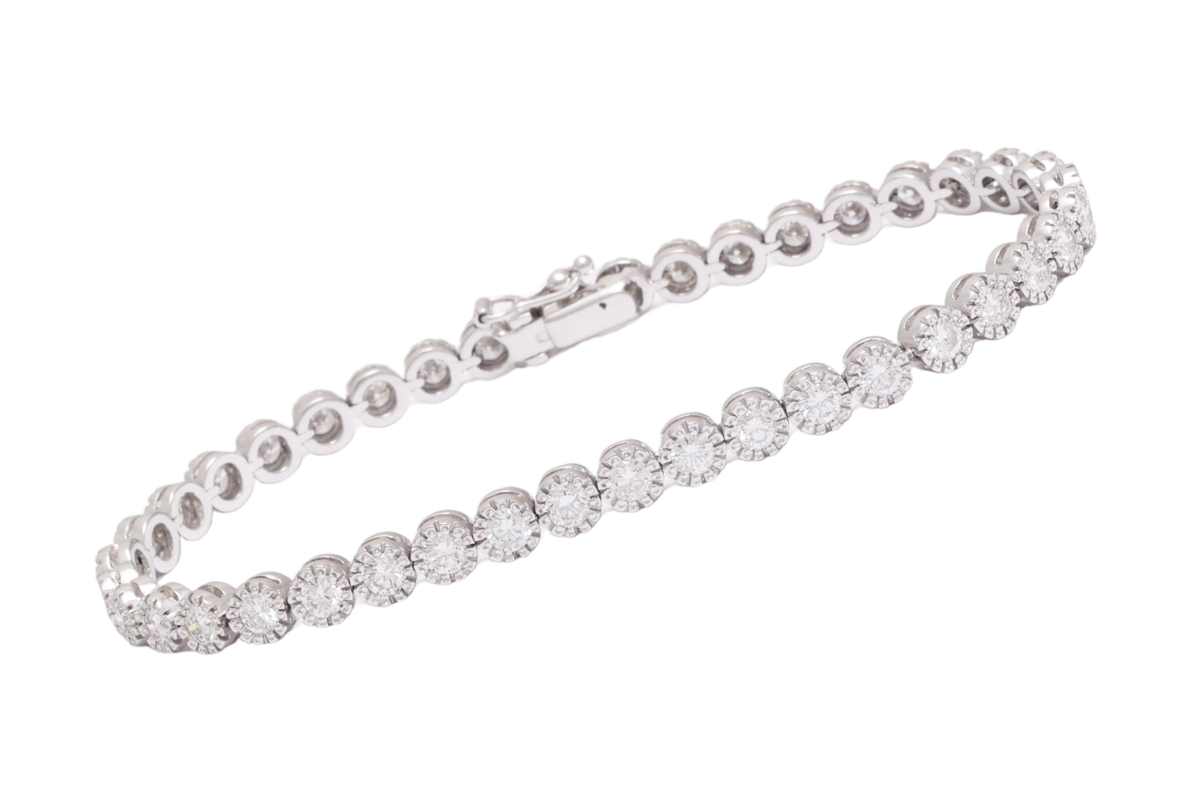 Beautiful 18 kt. White Gold Tennis Bracelet With 4 ct. Diamonds 

Diamonds: brilliant cut diamonds, together 4 ct. diamonds.

Material: 18 kt. white gold

Measurements: Bracelet length 18 cm

Total weight: 14.2 grams / 0.500 oz / 9.1 dwt

Bracelet