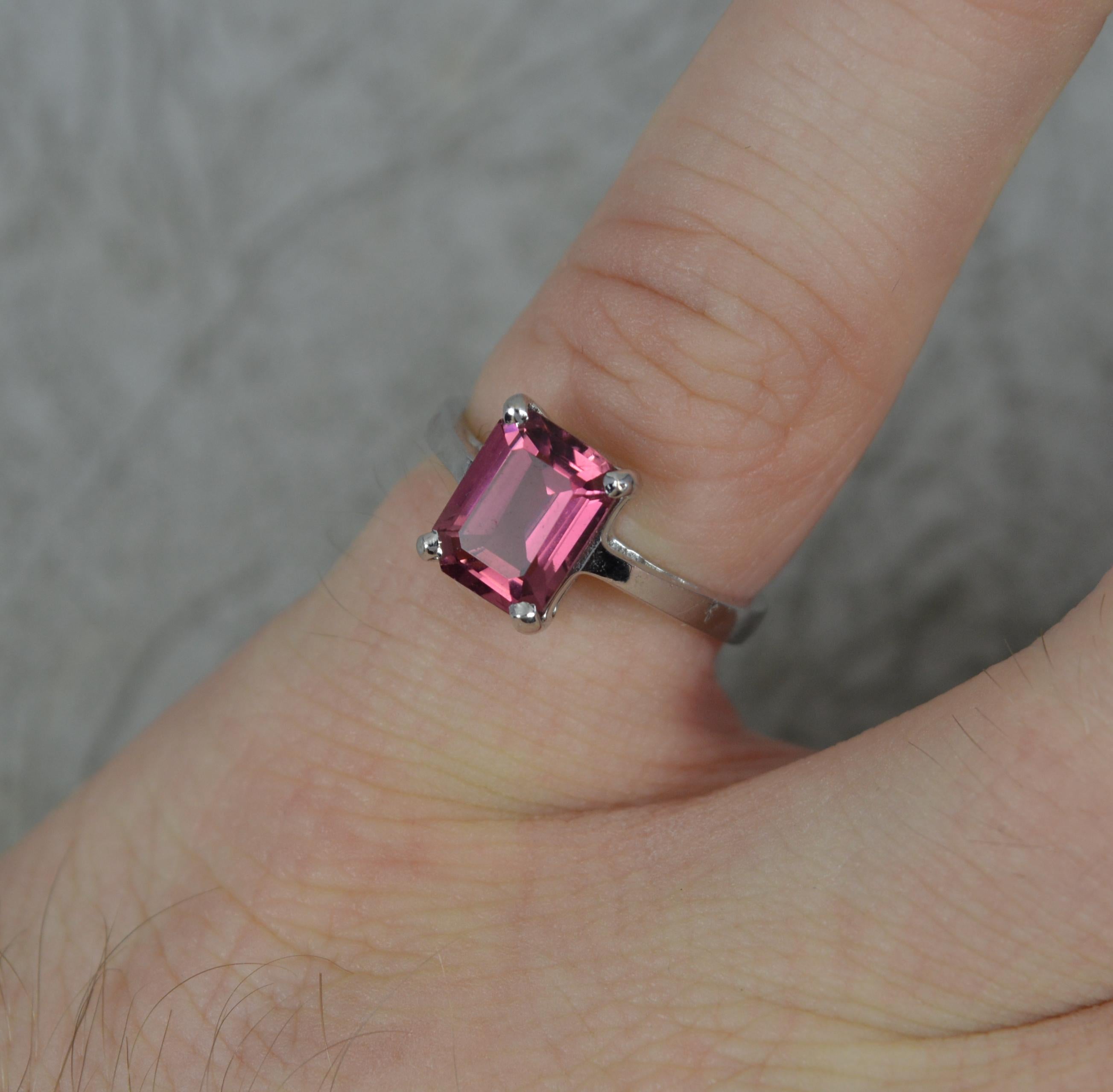 A superb Tourmaline solitaire ring.
Solid 18 carat white gold shank and setting.
Set with a single, emerald cut natural tourmaline. 6mm x 8mm, 1.75 carats. Wonderful colour.

CONDITION ; Very good. Crisp design. Well set, clean stone. Issue free.