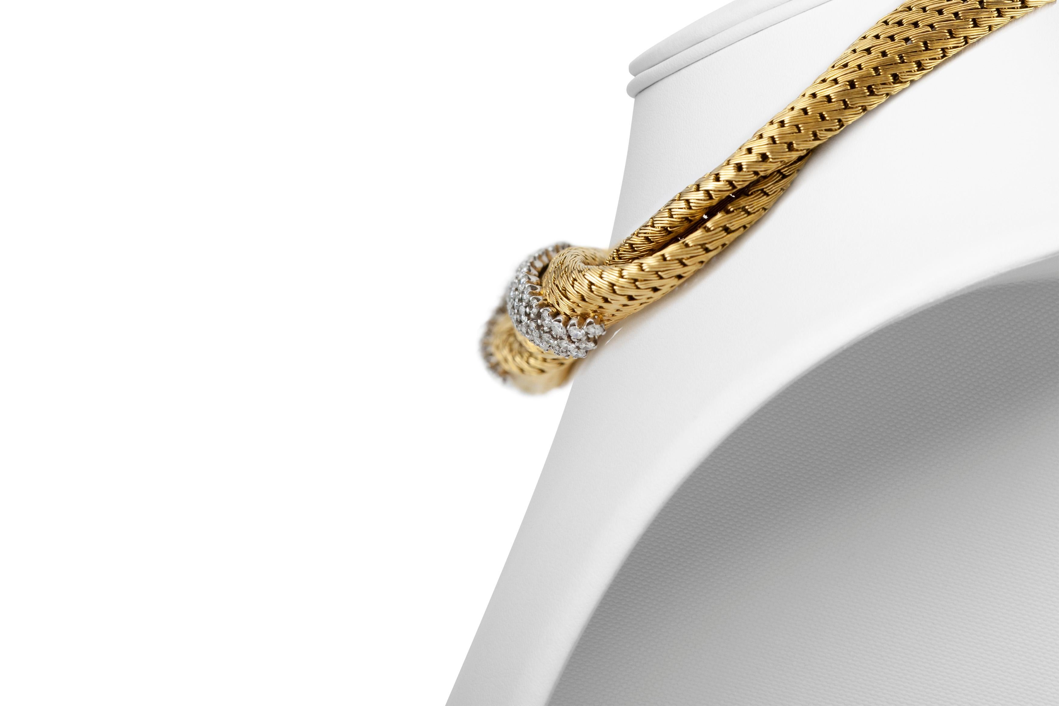 The necklace is finely crafted in 18k yellow gold with diamonds weighing approximately total of 4.50 carat.