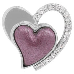 Magnifique pendentif cœur bicolore 18 carats avec d'étonnants diamants brillants