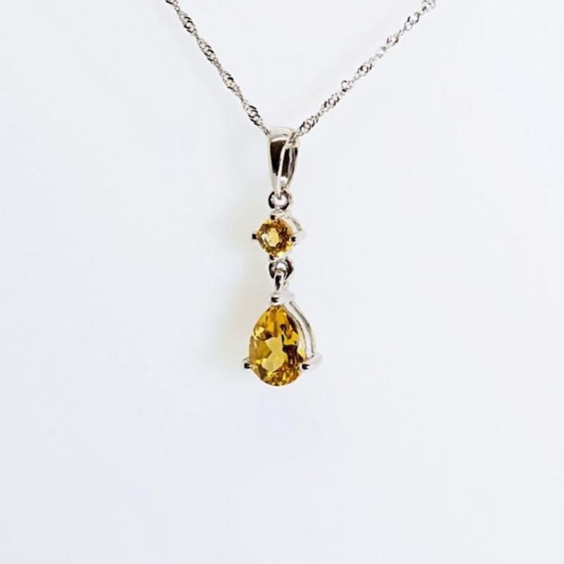 Pear Cut Glamorous 0.60ct Citrine Pendant in 18K White Gold