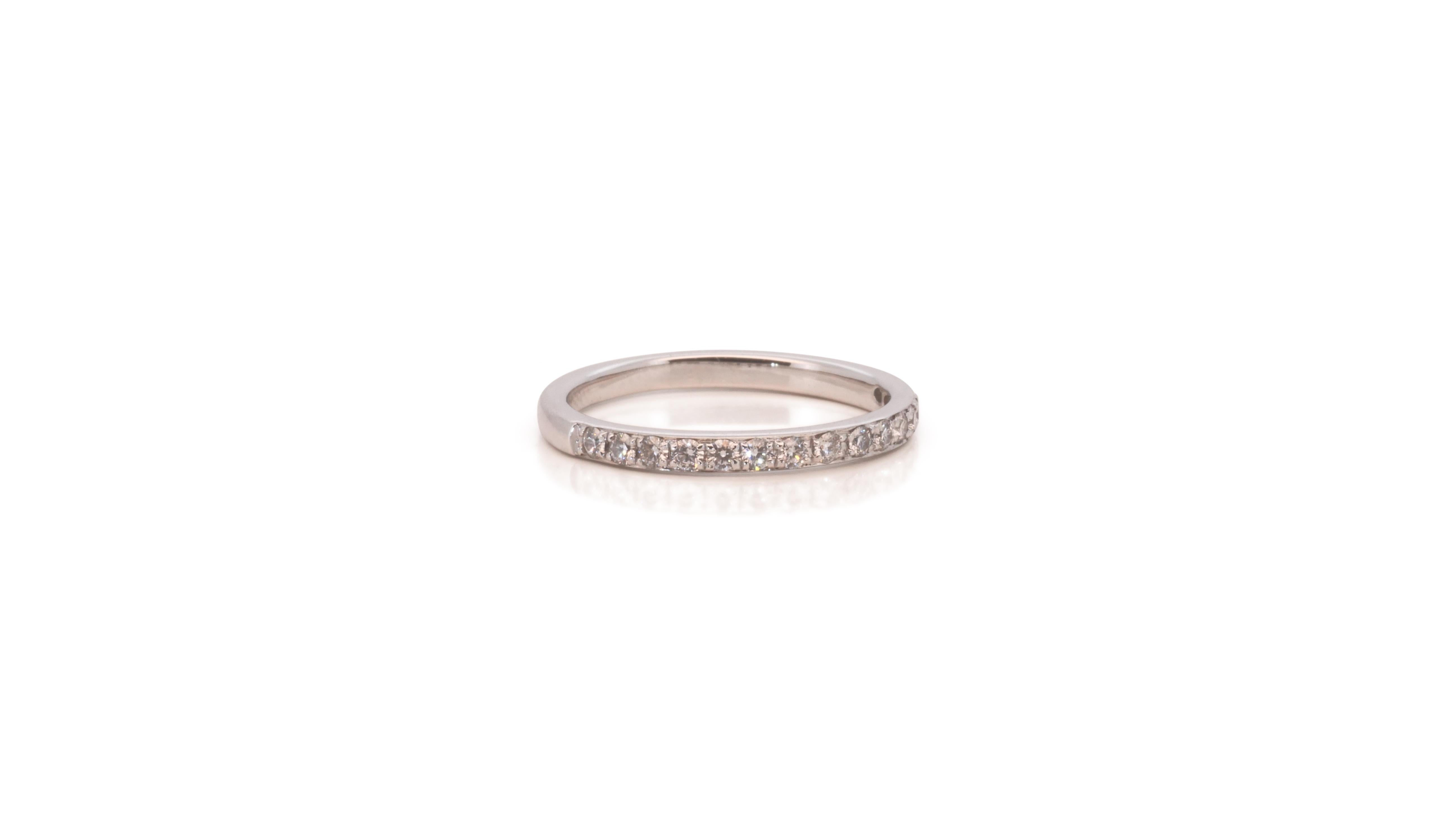 A gorgeous pave thin band ring with a dazzling 0.16 carat round brilliant diamonds. The jewelry is made of 18k white gold with a high quality polish. It comes with a fancy jewelry box.

16 diamonds main stone total of: 0.16 carat
cut: round