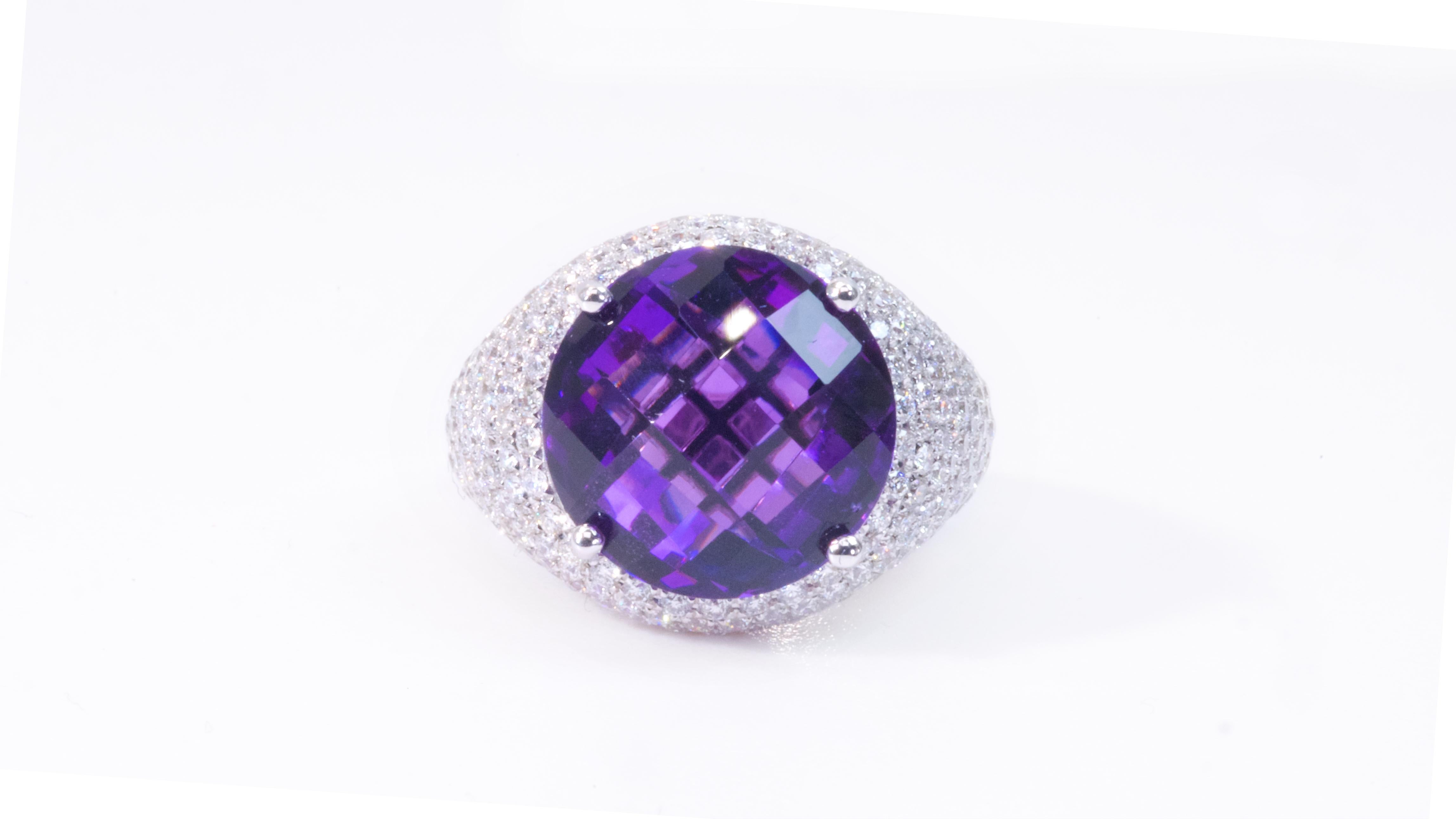 Stunning halo pave amethyst ring made from 18k white gold with 8.30 total carat of rose cut amethyst and round brilliant diamonds. This ring comes with an AIG certificate and a fancy box.

-1 amethyst main stone of 6.30 ct.
cut: rose cut
color: