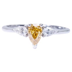 Beautiful 18k White Gold Three Stone Ring with 0.77 ct Natural Diamond- AIG cert