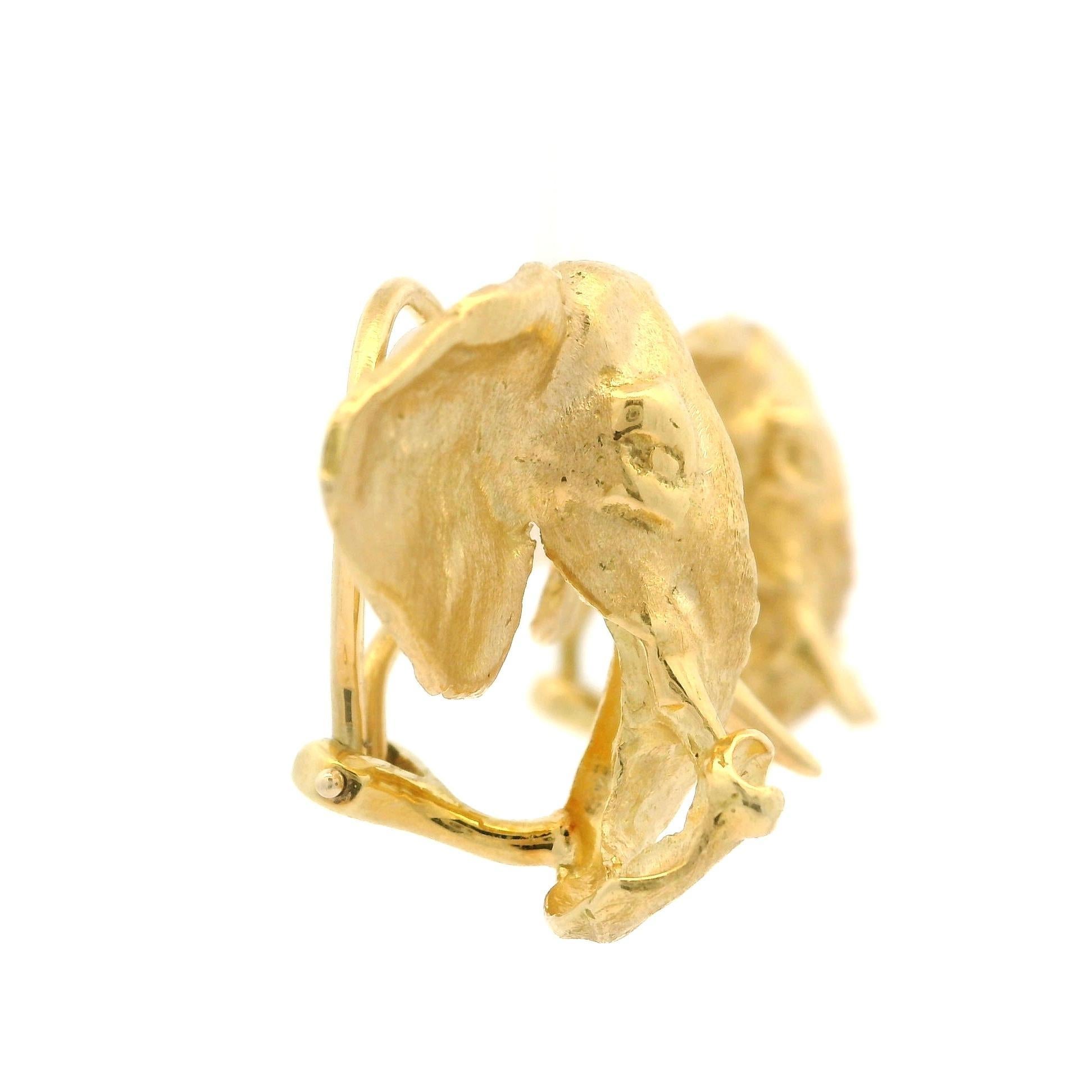 Material: 18k Solid Yellow Gold 
Weight: 15.63 Grams
Backing: Clip On Closures (Pierced ears are NOT required) (Posts can be added upon request.)
Height: 21.5mm (0.84