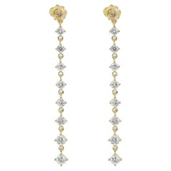 Beautiful 18K yellow gold earrings with dazzling 2.95 carat Natural Diamond