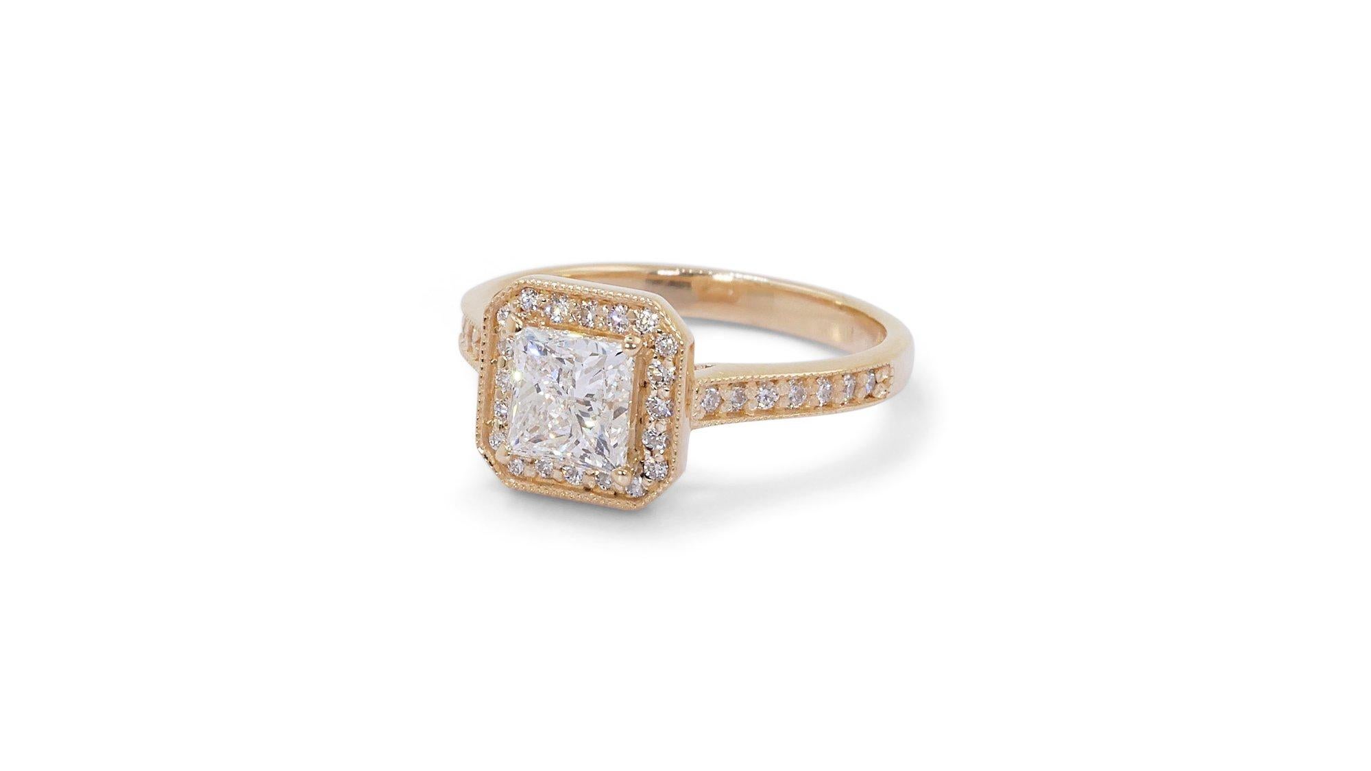Beautiful 18K Yellow Gold Natural Diamond Princess Halo Ring w/1.36 Carat - GIA Certified

A beautiful diamond princess halo ring showcasing a 1.01 carat center stone. The center stone is complemented by a sparkling halo of 34 round brilliant cut