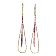 Beautiful 18Kt Ruby and diamond dangle earrings