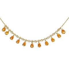 Schöne Halskette aus 18 Karat YG Granat und Diamant