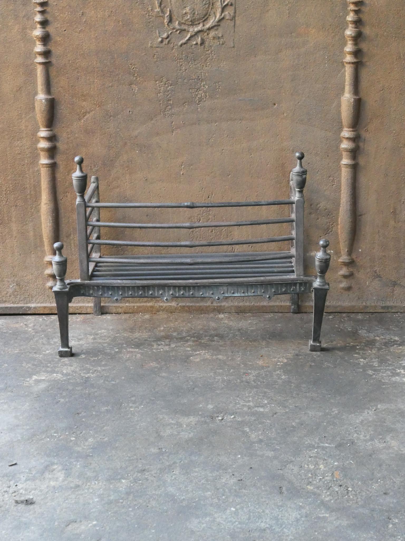 Beautiful late 18th or early 19th century Dutch Neoclassical fireplace grate. Hand forged of wrought iron. The fireplace grate is in a good condition and is fully functional. 







