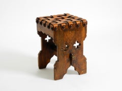 Beautiful 1940s oak stool with a seat made of leather straps