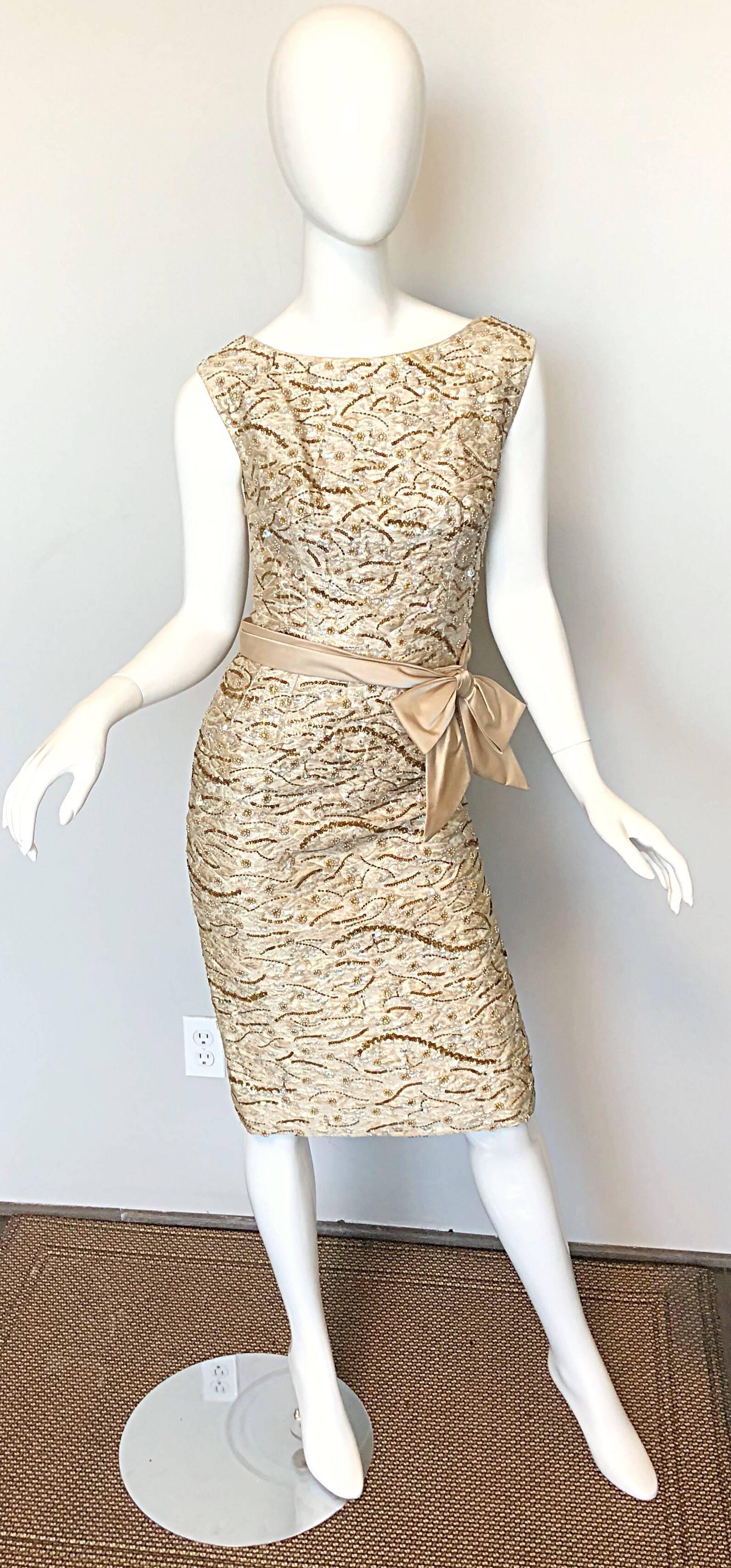 Absolutely beautiful vintage late 1950s EDWARD ABBOTT champagne beige silk brocade beaded demi couture wiggle dress! Stunning silhouette that really flatters the body. Luxurious silk brocade in a lovely beige champagne color, with thousands of