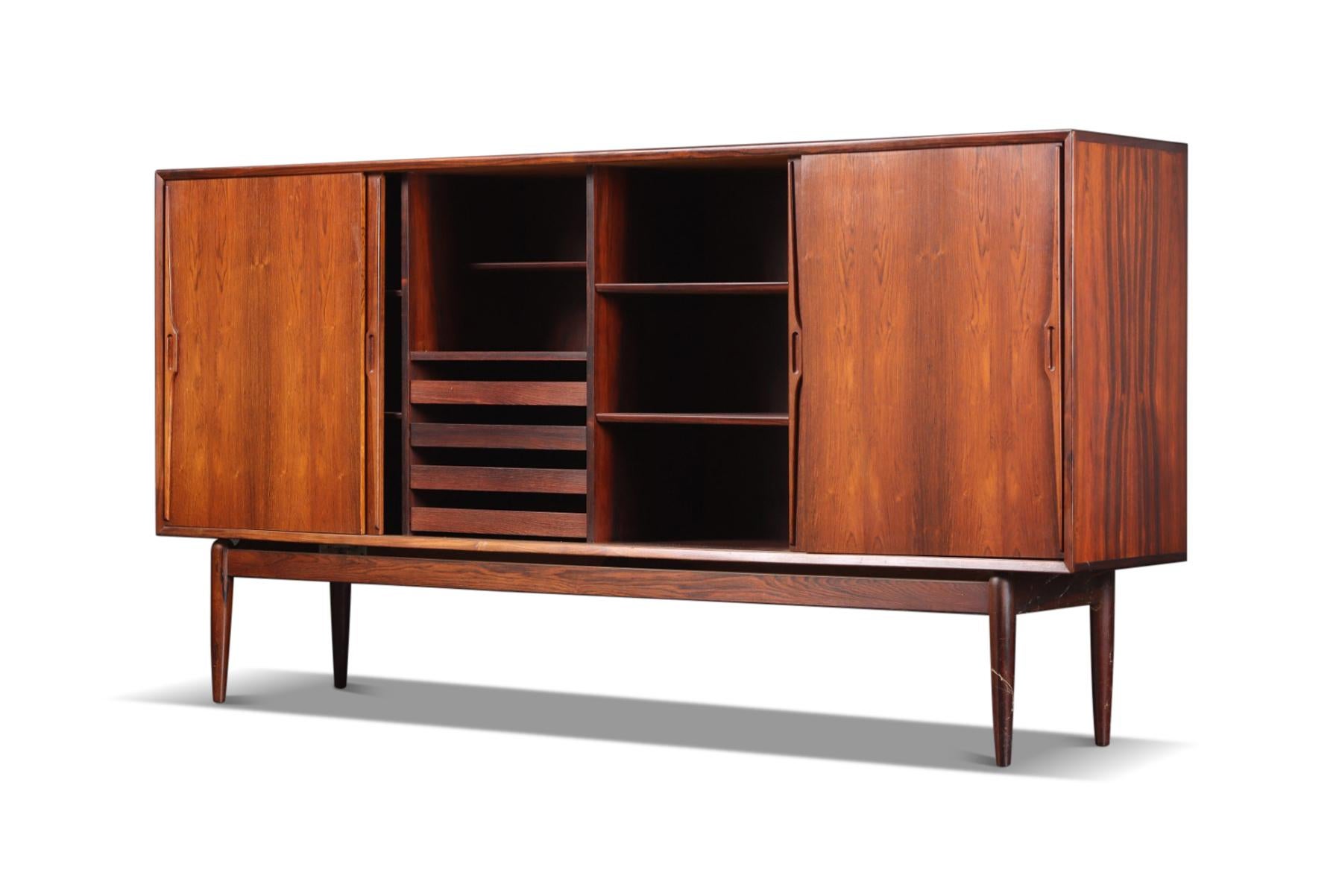 Origin: Denmark
Designer: Unknown
Manufacturer: Unknown
Era: 1960s
Materials: Rosewood
Measurements: 86.75? wide x 17.75? deep x 44.5? tall

Condition: In excellent original condition with typical wear for their vintage.