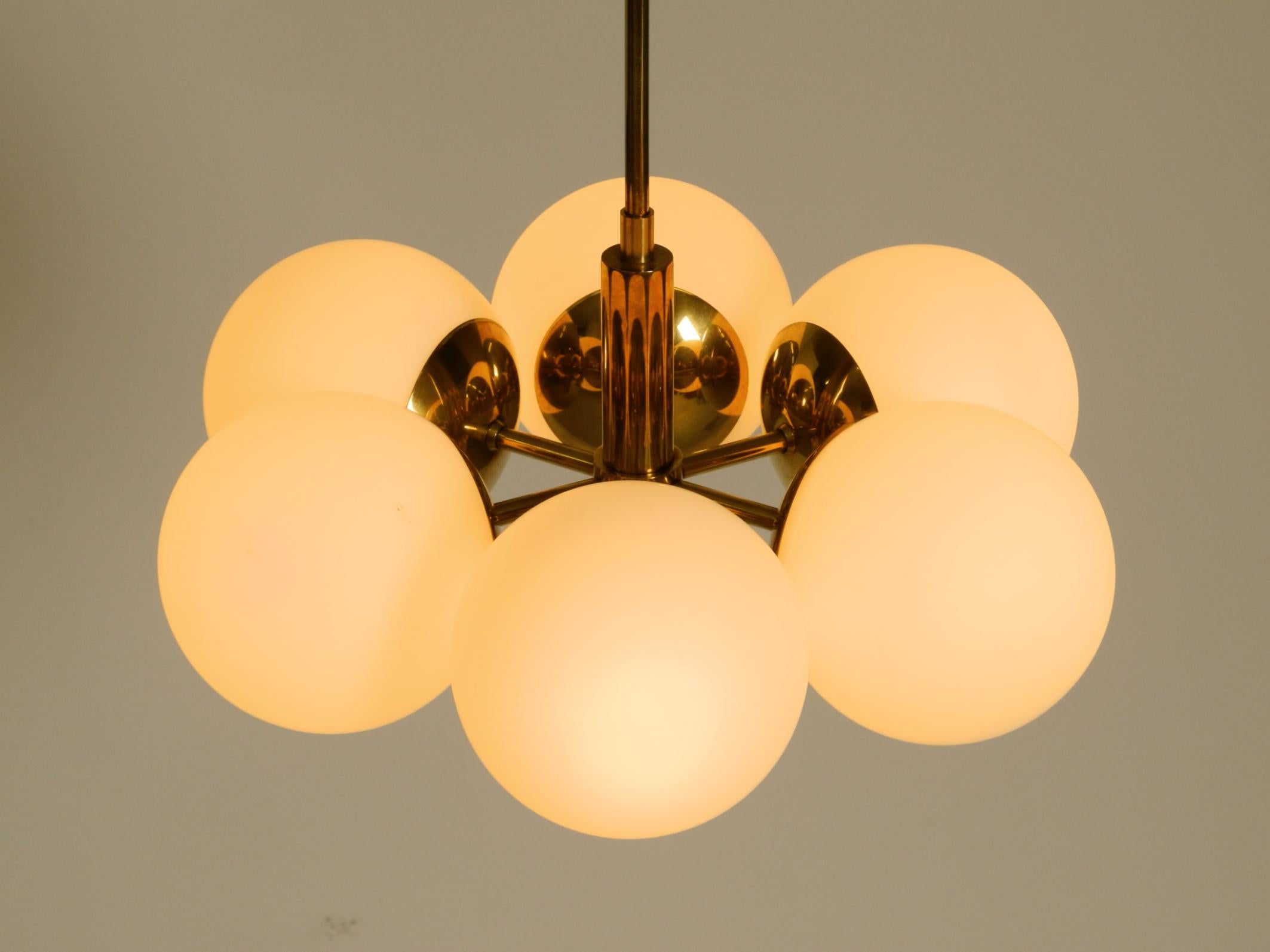 Laiton Beautiful 1960s Kaiser Leuchten brass ceiling lamp with 6 opal glass shades en vente