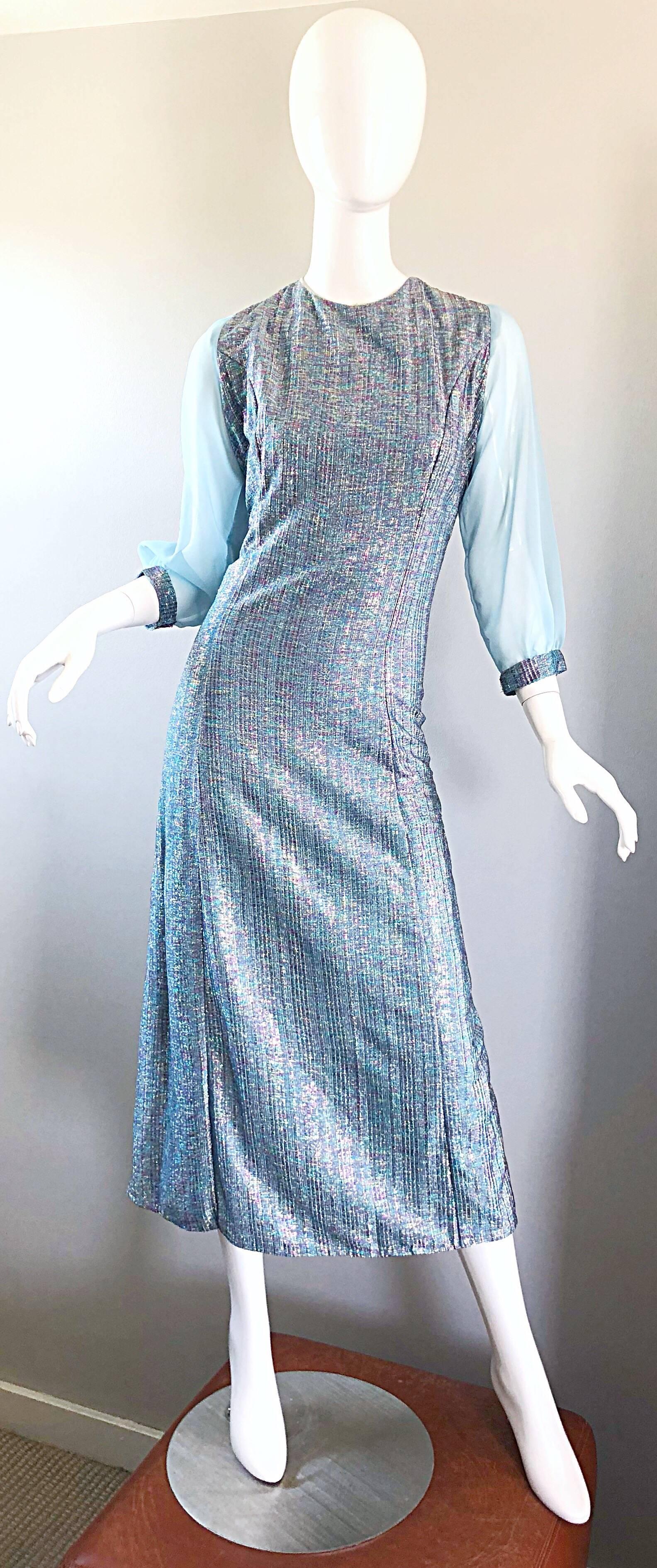 Beautiful late 1960s light blue colorful iridescent metallic midi dress / gown! Features a pale blue rainbow colored lurex body, with semi sheer chiffon balloon sleeves. Fantastic fit, with lots of attention to detail. Full hidden metal zipper up