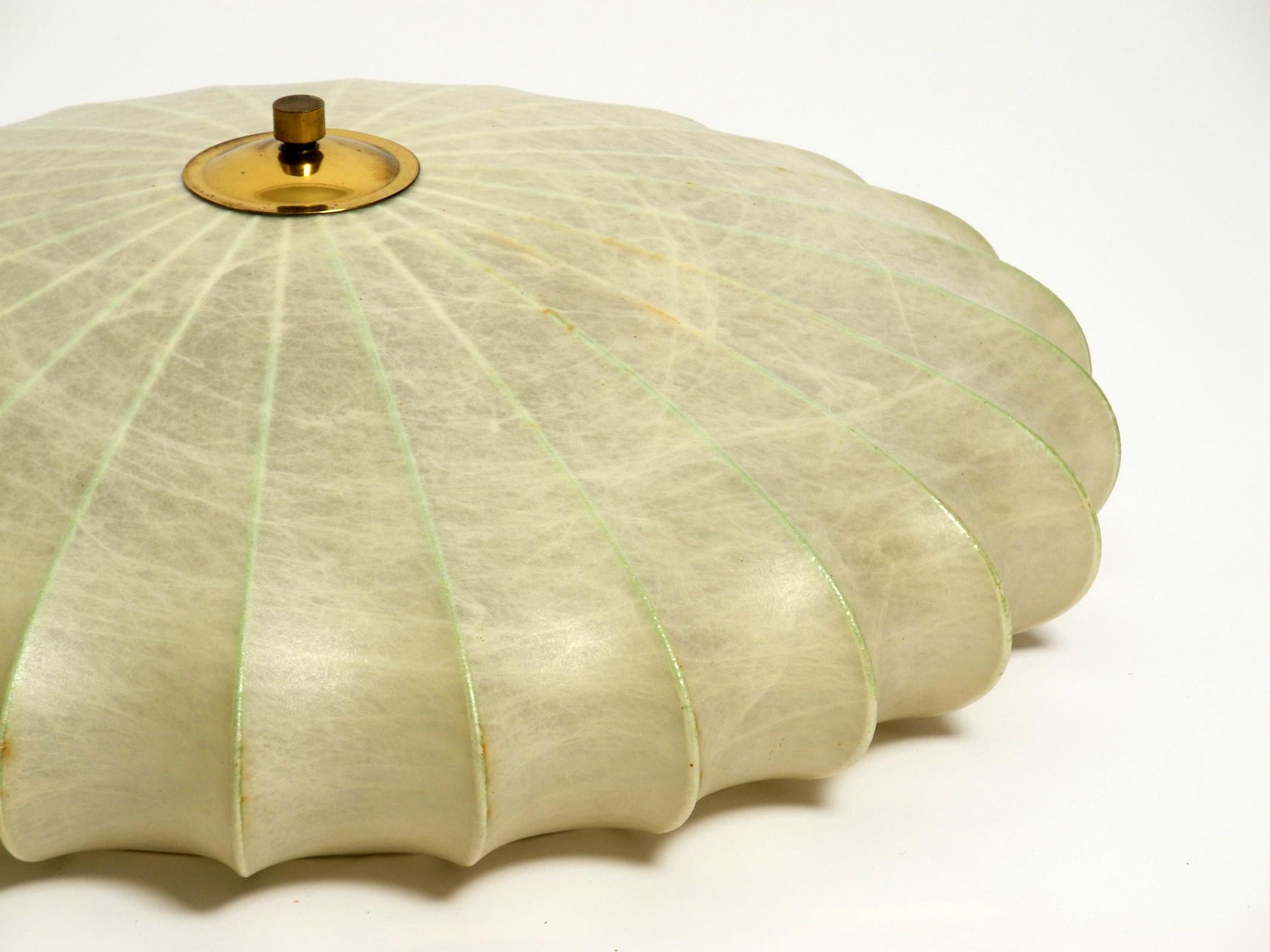 Metal Beautiful 1960s round Cocoon ceiling lamp with metal frame For Sale