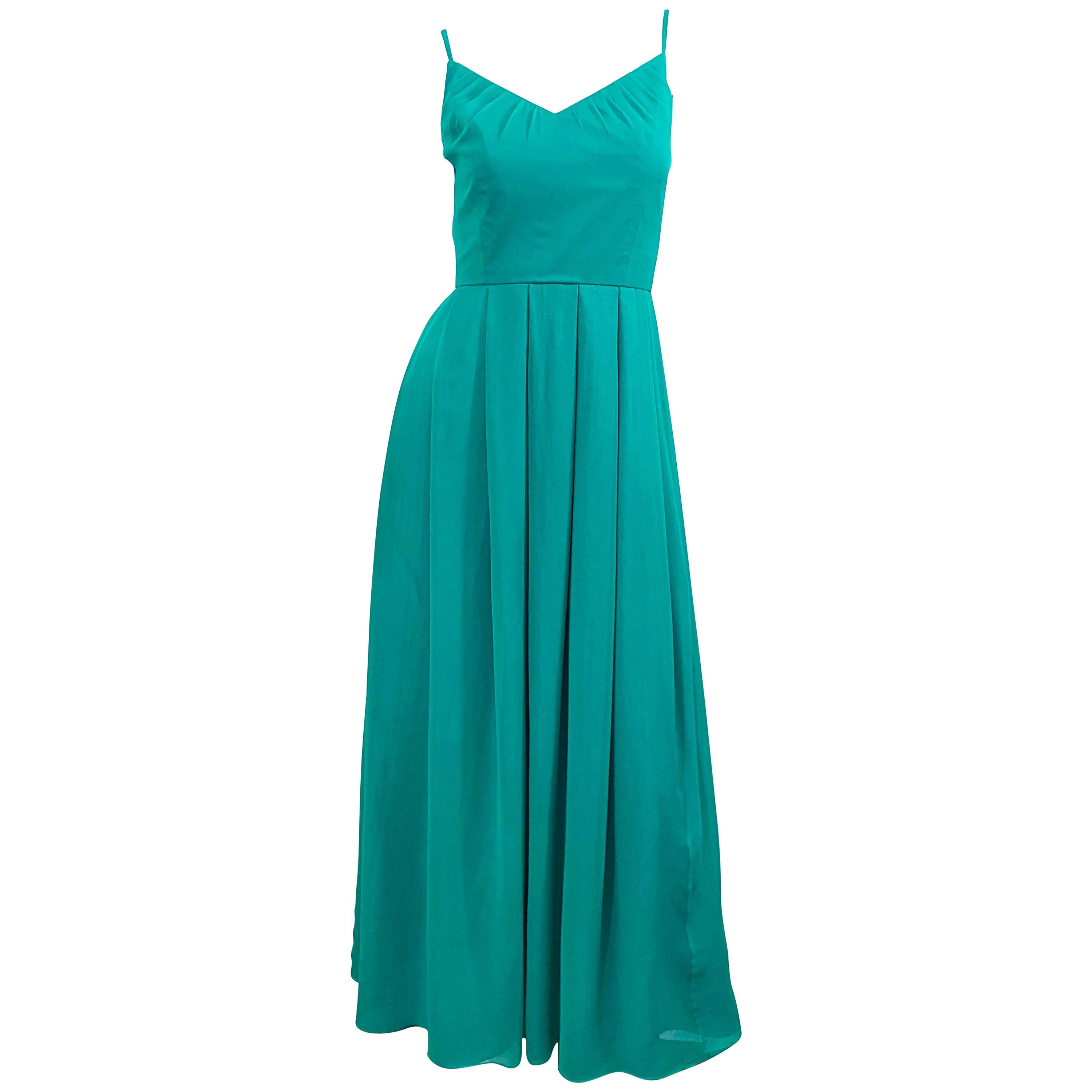 Precioso vestido de los años 70 de gasa de seda de color azul turquesa, talla 8 / 10 en venta