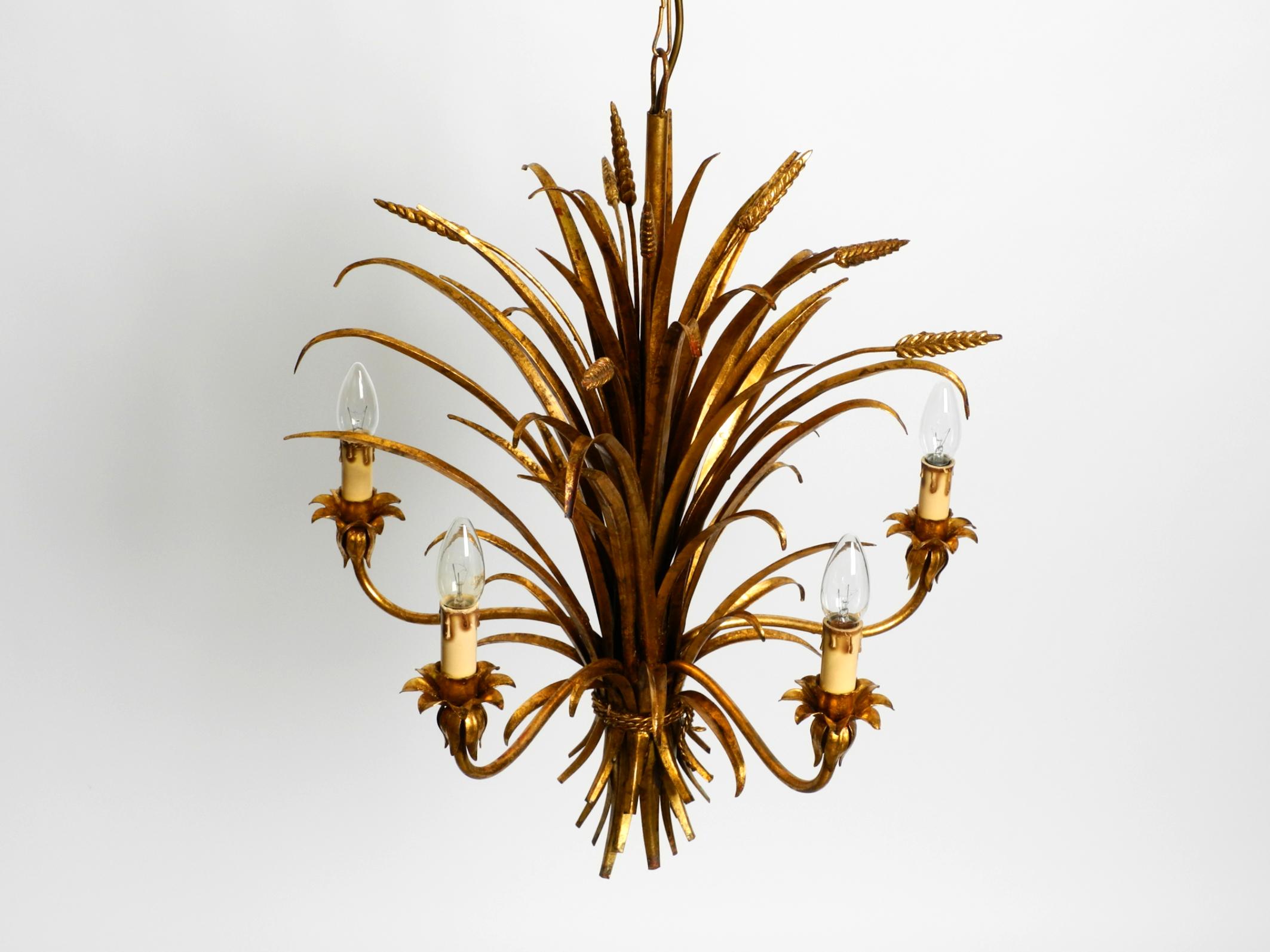 Beautiful 1970s gold-plated 5-arm tall metal chandelier by Hans Kögl For Sale 3