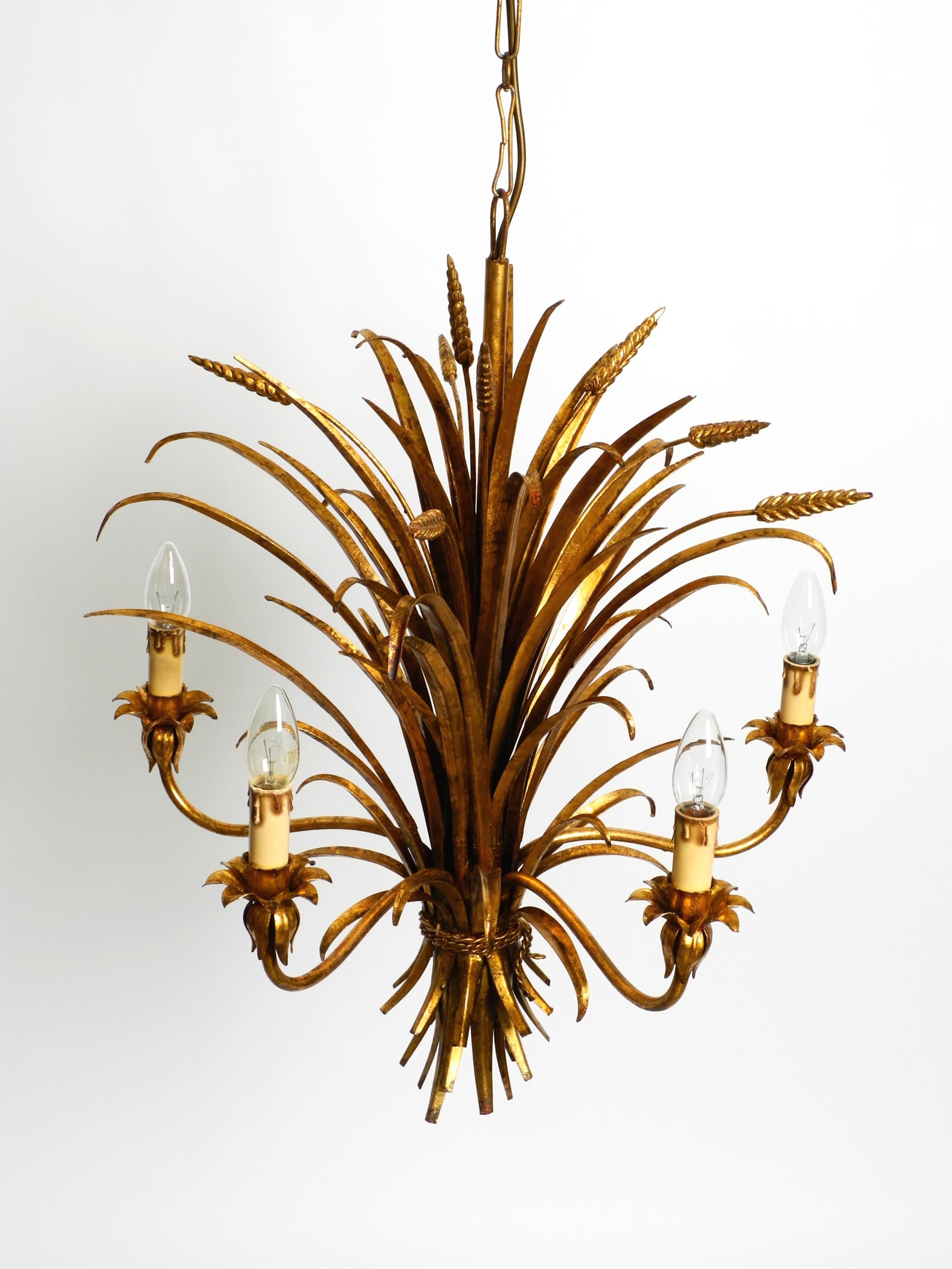 Beautiful 1970s gold-plated 5-arm tall metal chandelier by Hans Kögl For Sale 4