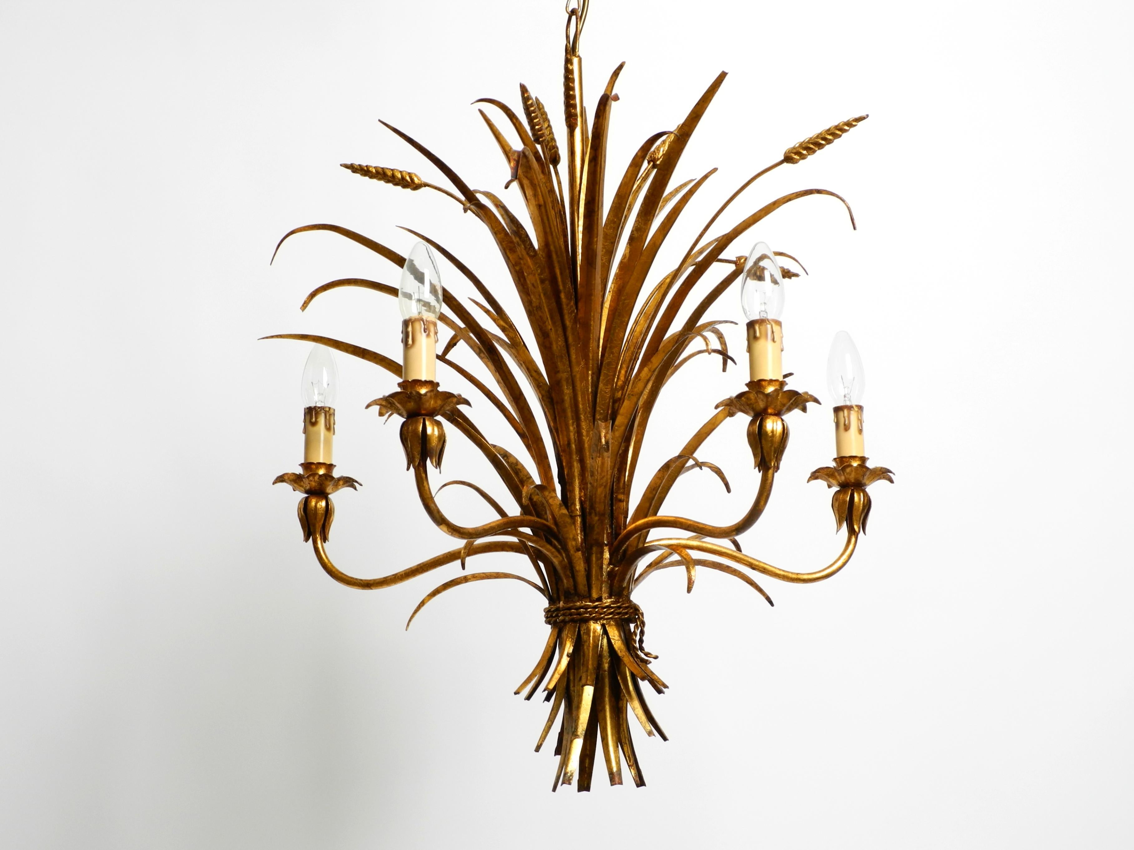 German Beautiful 1970s gold-plated 5-arm tall metal chandelier by Hans Kögl For Sale