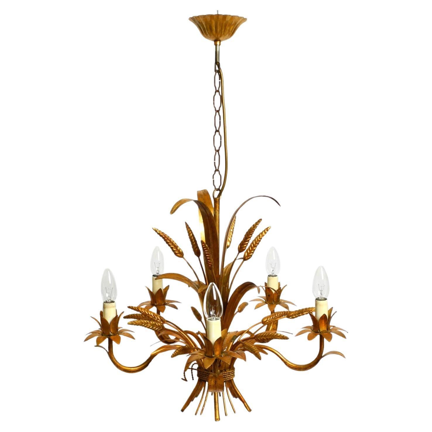 Beautiful 1970s gold-plated 5-arm tall metal chandelier by Hans Kögl im Angebot