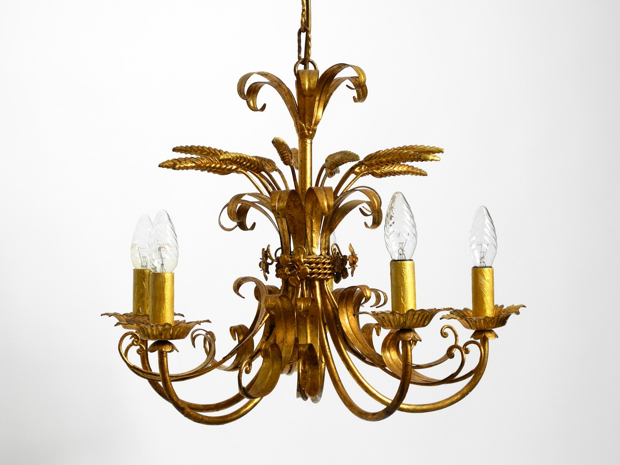 European Beautiful 1970s gold-plated large 5-armed metal chandelier by Hans Kögl