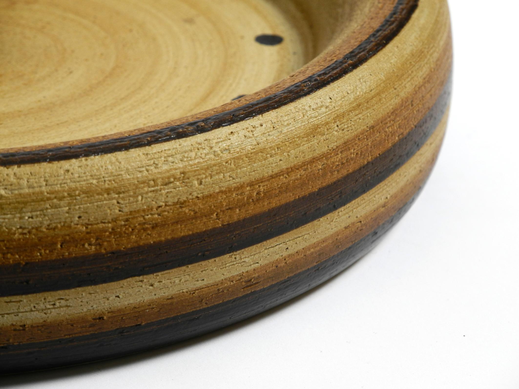 Beautiful 1970s handmade round ceramic wall clock 1