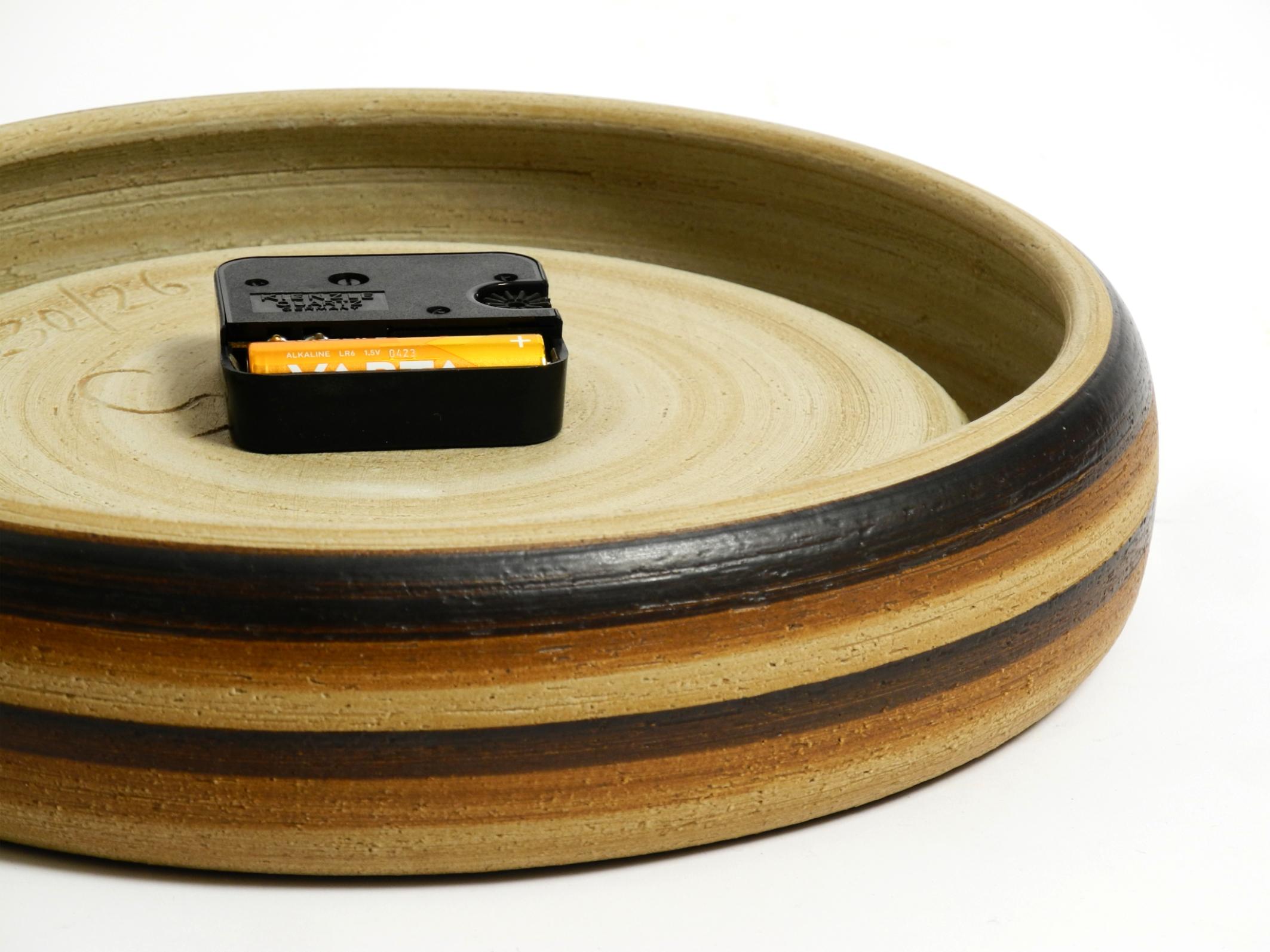 Beautiful 1970s handmade round ceramic wall clock 2