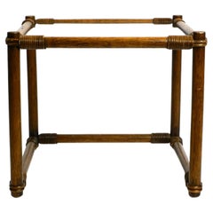 Beautiful 1970s side table made of dark bamboo wood with a glass top