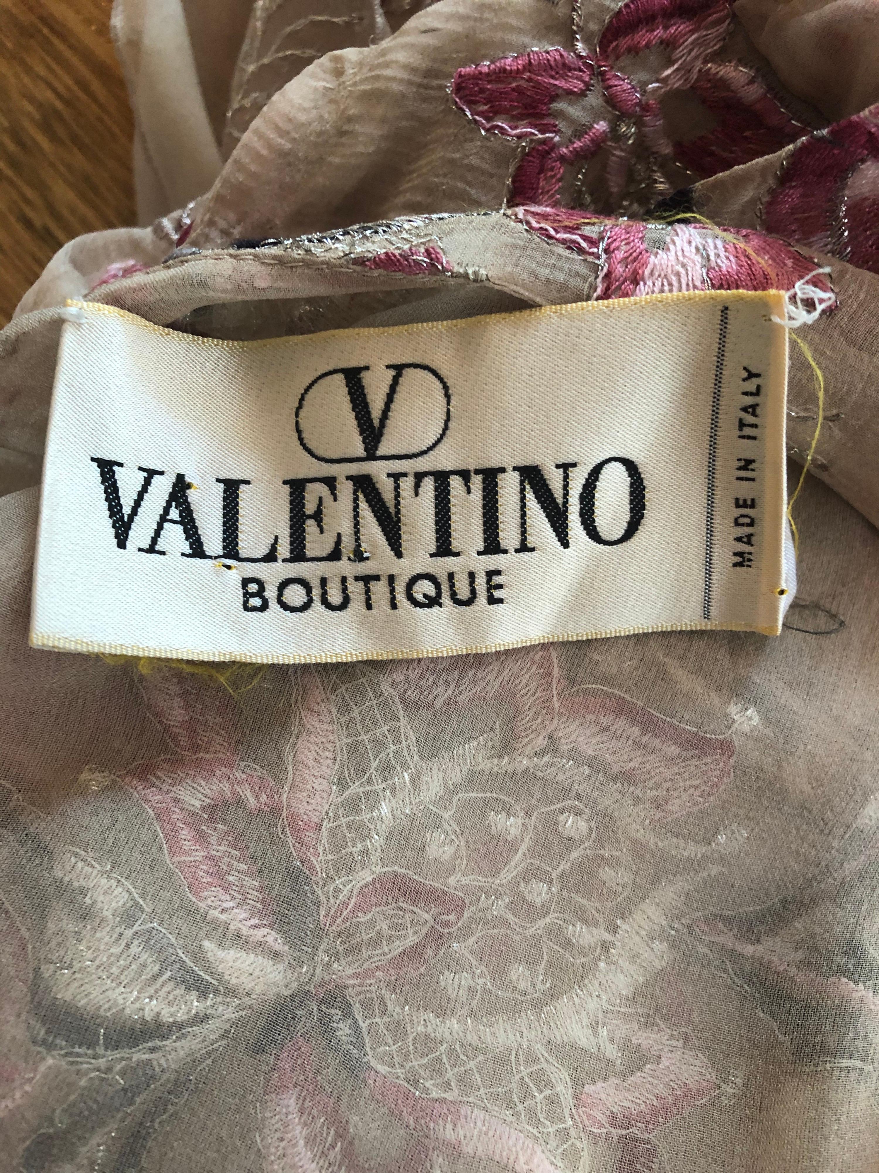 Beautiful 1990s VALENTINO nude silk chiffon semi sheer embroidered dress ! Pictures do not even begin to do this rare gem justice. Hand embroidery in various shades of pink, gray, white and metallic silver throughout. Couture quality with heavy