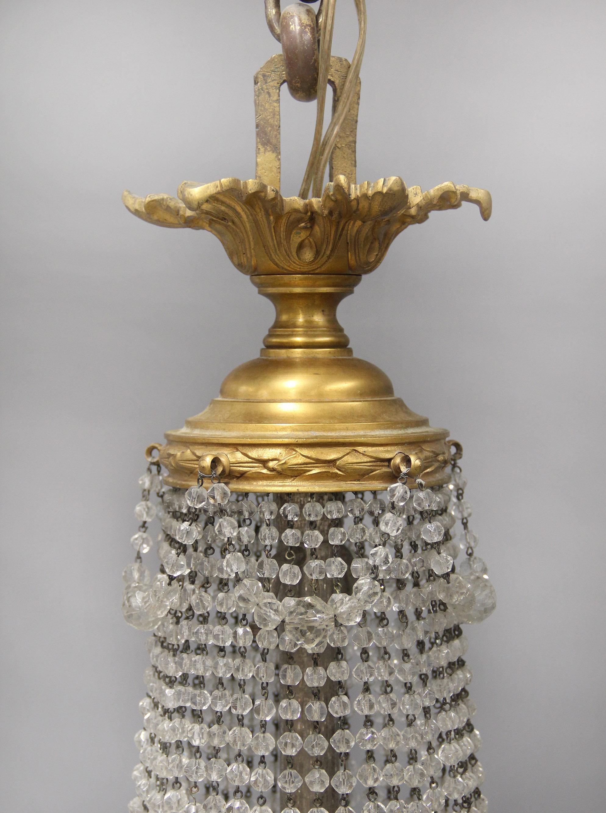 French Beautiful 19th Century Bronze and Beaded Seventeen Light Drop Crystal Chandelier For Sale