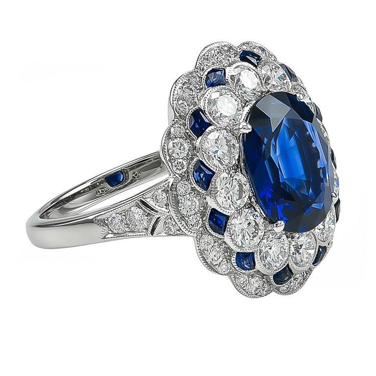 Art deco platinum ring with oval cut shape blue sapphire that weighs 2.19 carats accented with small sapphires weighing 0.20 carats along with diamonds weighing 0.68 carats. 

Sophia D by Joseph Dardashti LTD has been known worldwide for 35 years