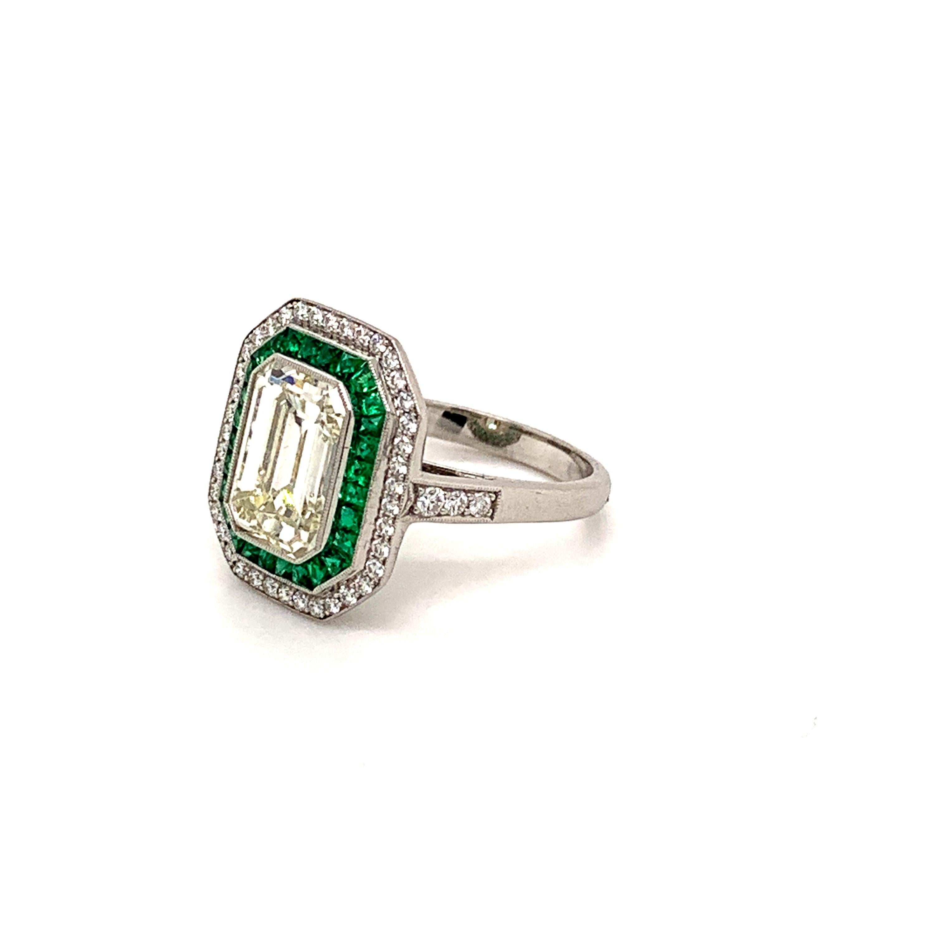 Sophia D's Art Deco inspired platinum ring that features an emerald cut diamond weighing 2.84 carats accented by small round diamonds with the total weight of 0.31 carat and French cut green emeralds weighing 0.50 carats.

Sophia D by Joseph