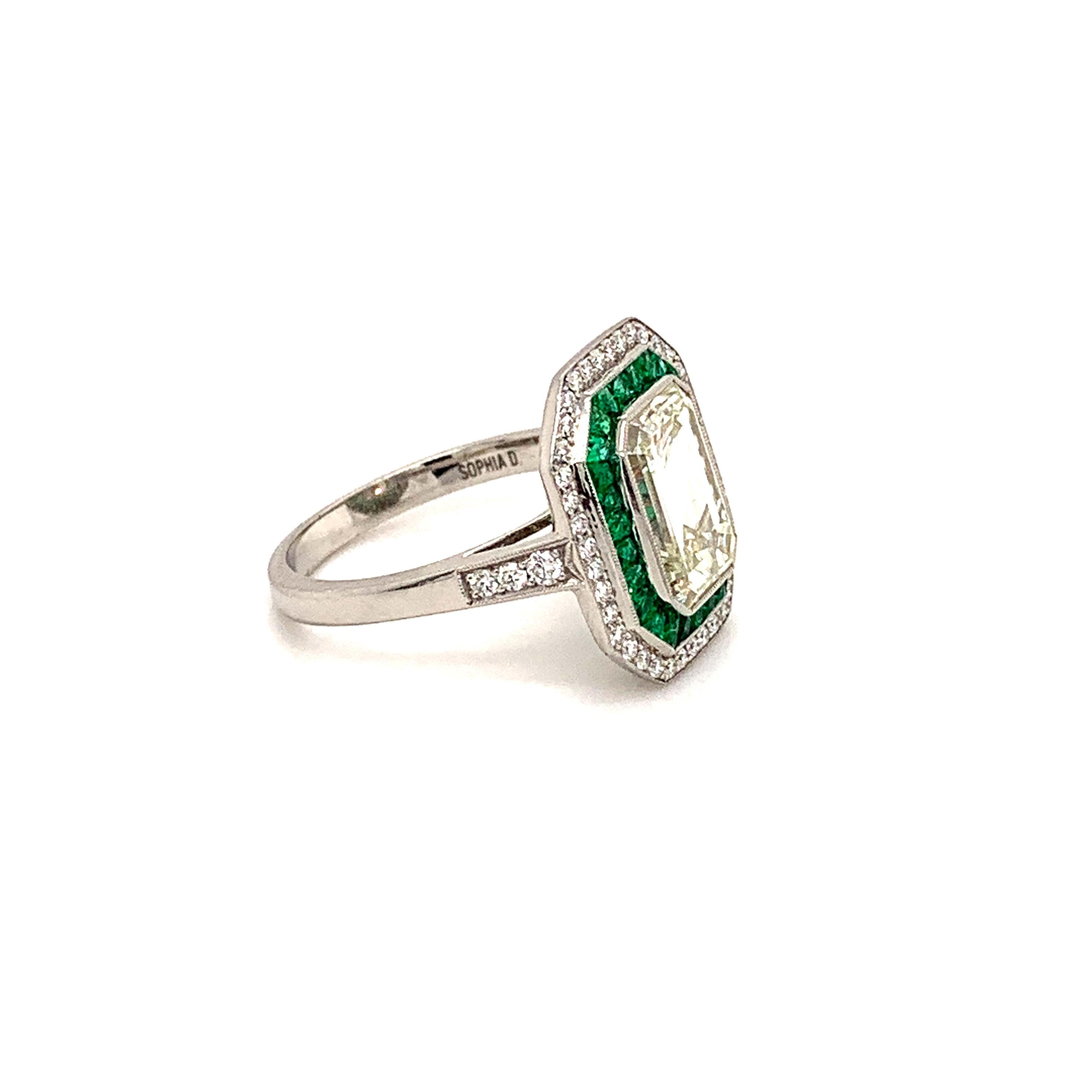 emerald ring surrounded by diamonds