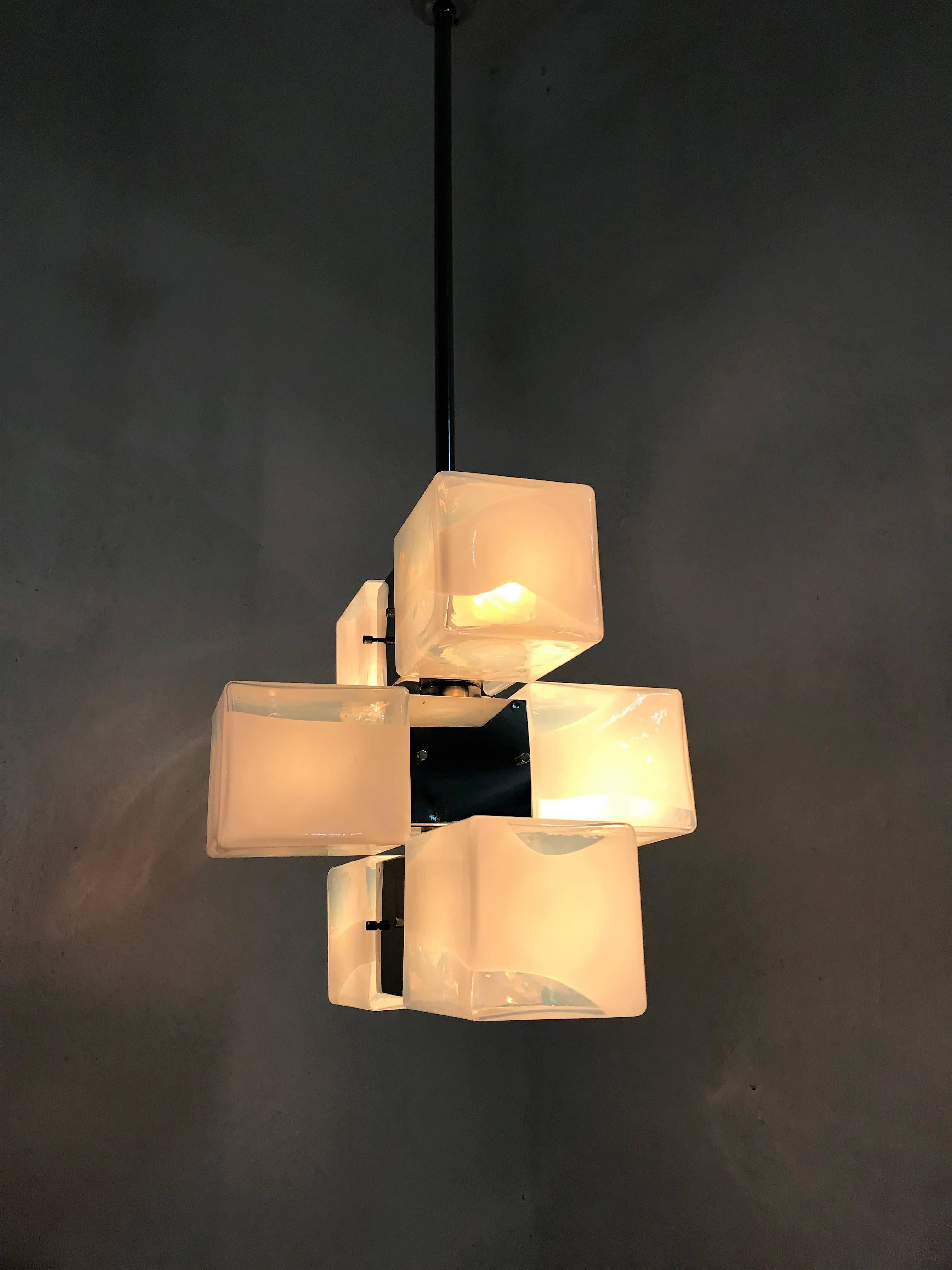 Six-light Mid-Century Modern chandelier in chromed hardware and handblown Murano glass by Mazzega, with Carlo Nason glass, Murano, Italy, circa 1970.