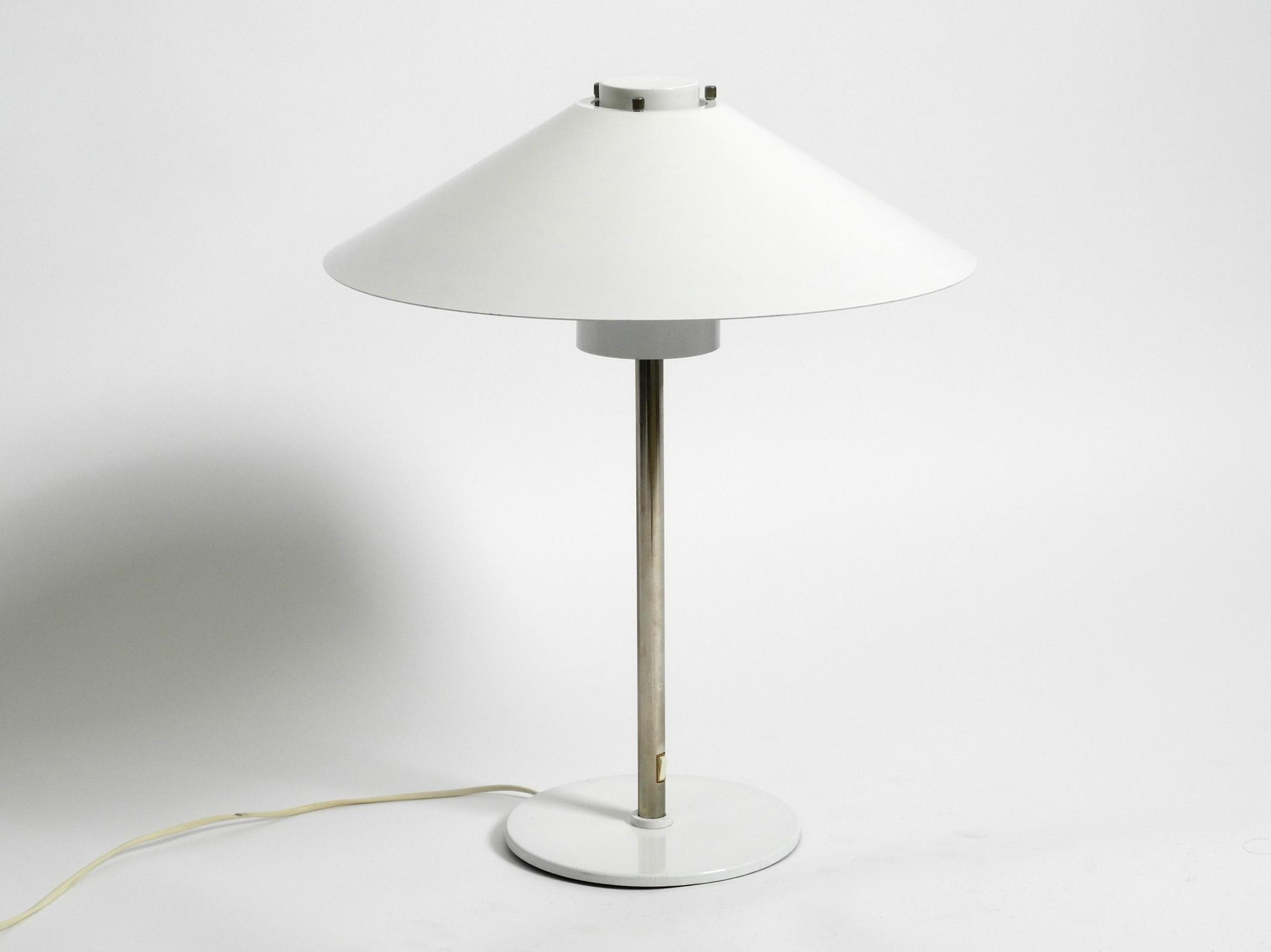 Beautiful rare 70s very big table lamp by Christian Hvidt for Nordisk Solar.
Very elegant minimalist design. Made in Denmark.
Entire lamp is made of metal in very good vintage condition.
With little signs of use. No bumps or dents on the screen,