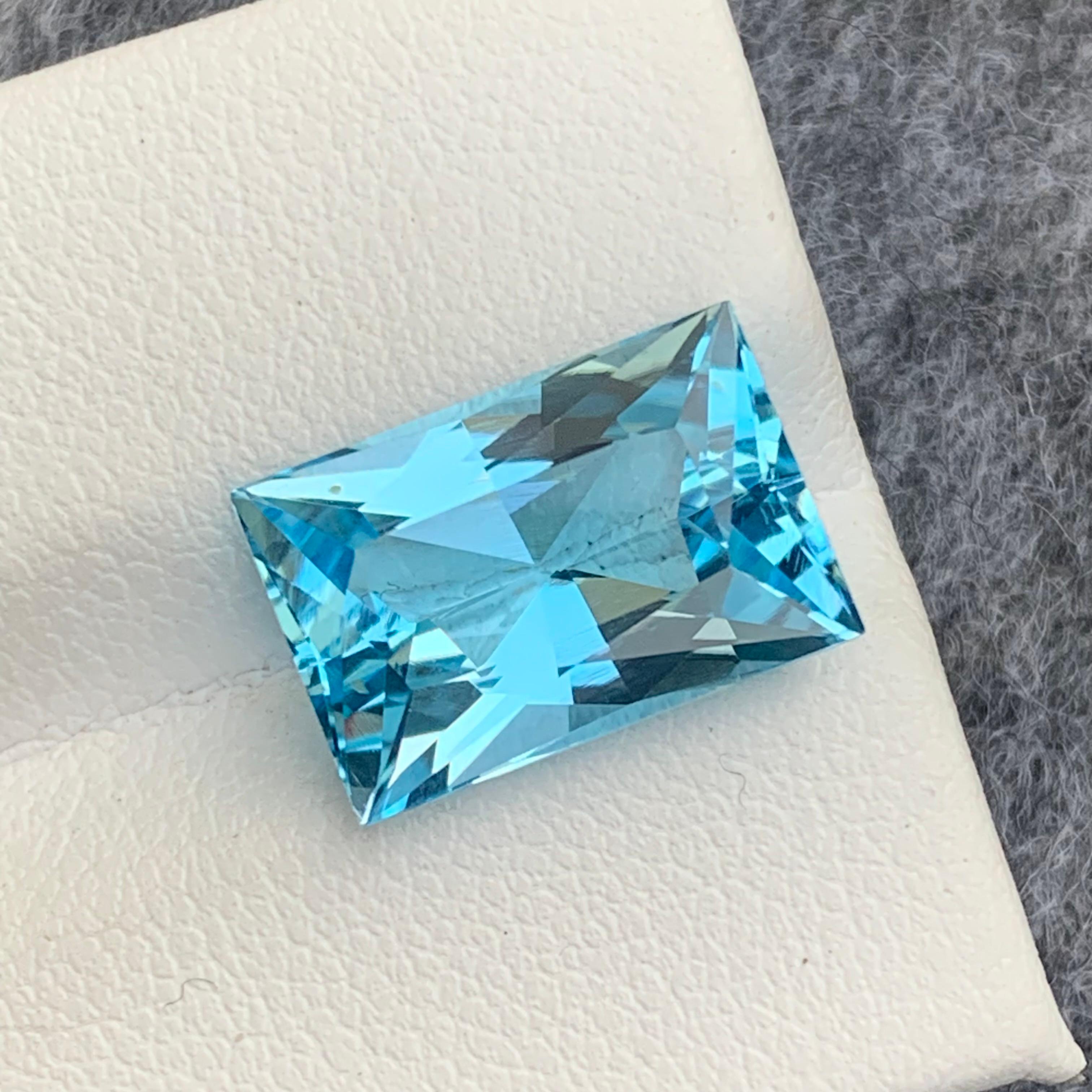 Faceted Sky Blue Topaz 
Weight : 8.50 Carats
Dimensions : 14.1x9.4x6.8 Mm
Origin : Brazil
Clarity : Loupe Clean
Shape: Baguette 
Color: Blue
Certificate: On Demand
.
Blue Topaz Metaphysical Properties
Blue topaz, in particular, is believed to