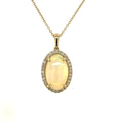 Beautiful 9.43ct Natural Cabochon Opal Pendant Surrounded by 0.25ct Diamonds