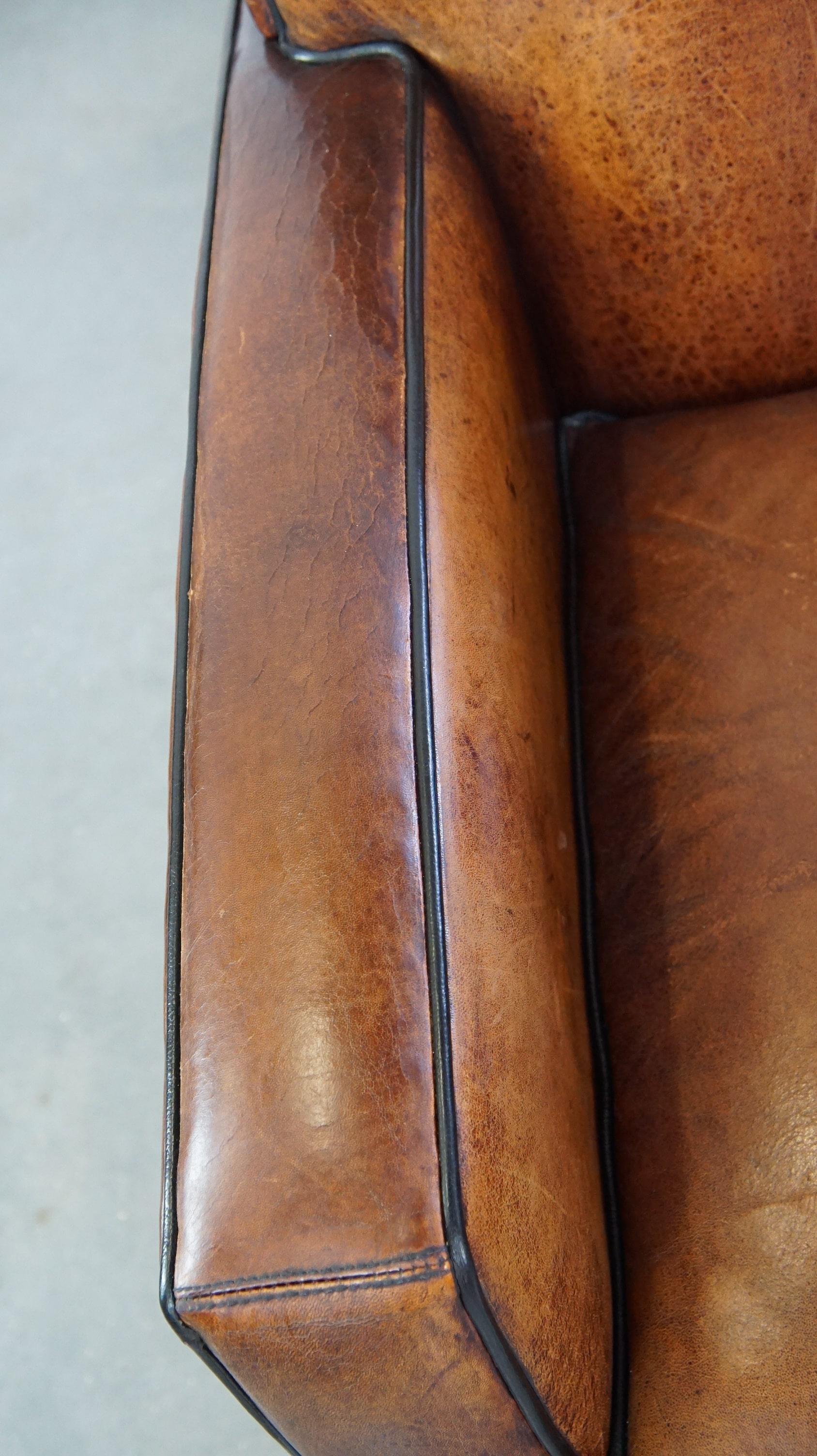 Pelle Bellissima e confortevole poltrona in pelle di pecora dal design Art Deco in vendita
