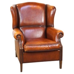 Beautiful and Comfortable Sheepskin Wingback Armchair with a Wonderful Patina
