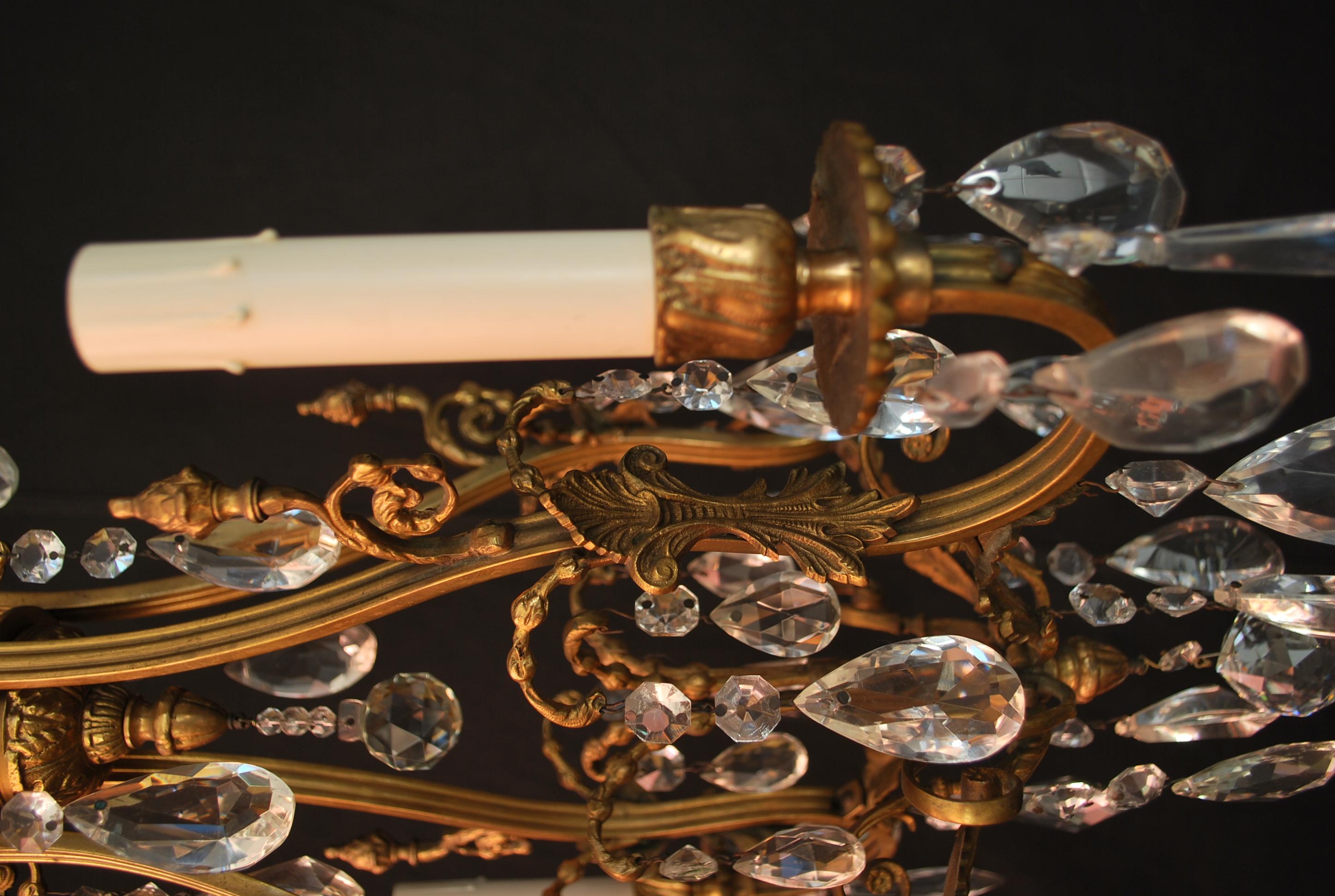 Brass Beautiful  and elegant French 1940's small crystals chandelier For Sale