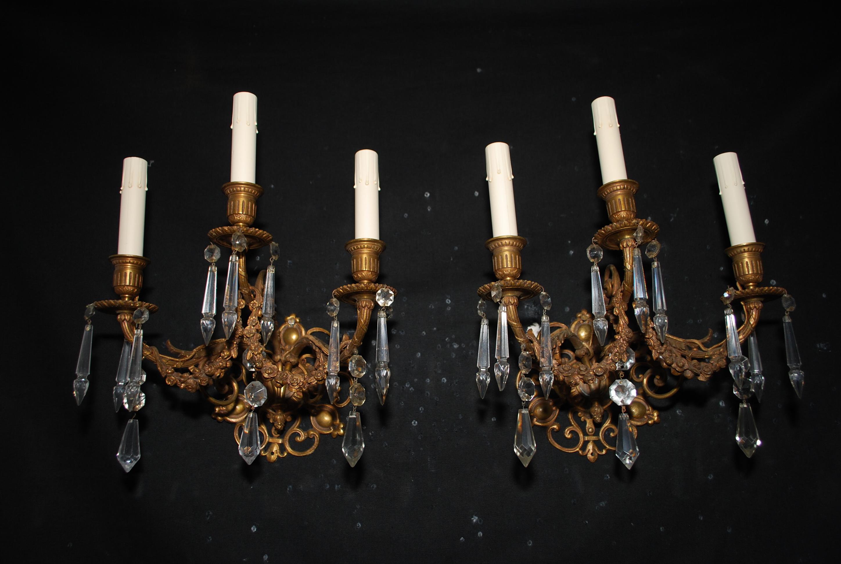 A beautiful pair of late 19th century French bronze sconces, the patina is so much nicer in person, and the details are amazing, the flash of the camera distorted a little the true beauty of the sconces.