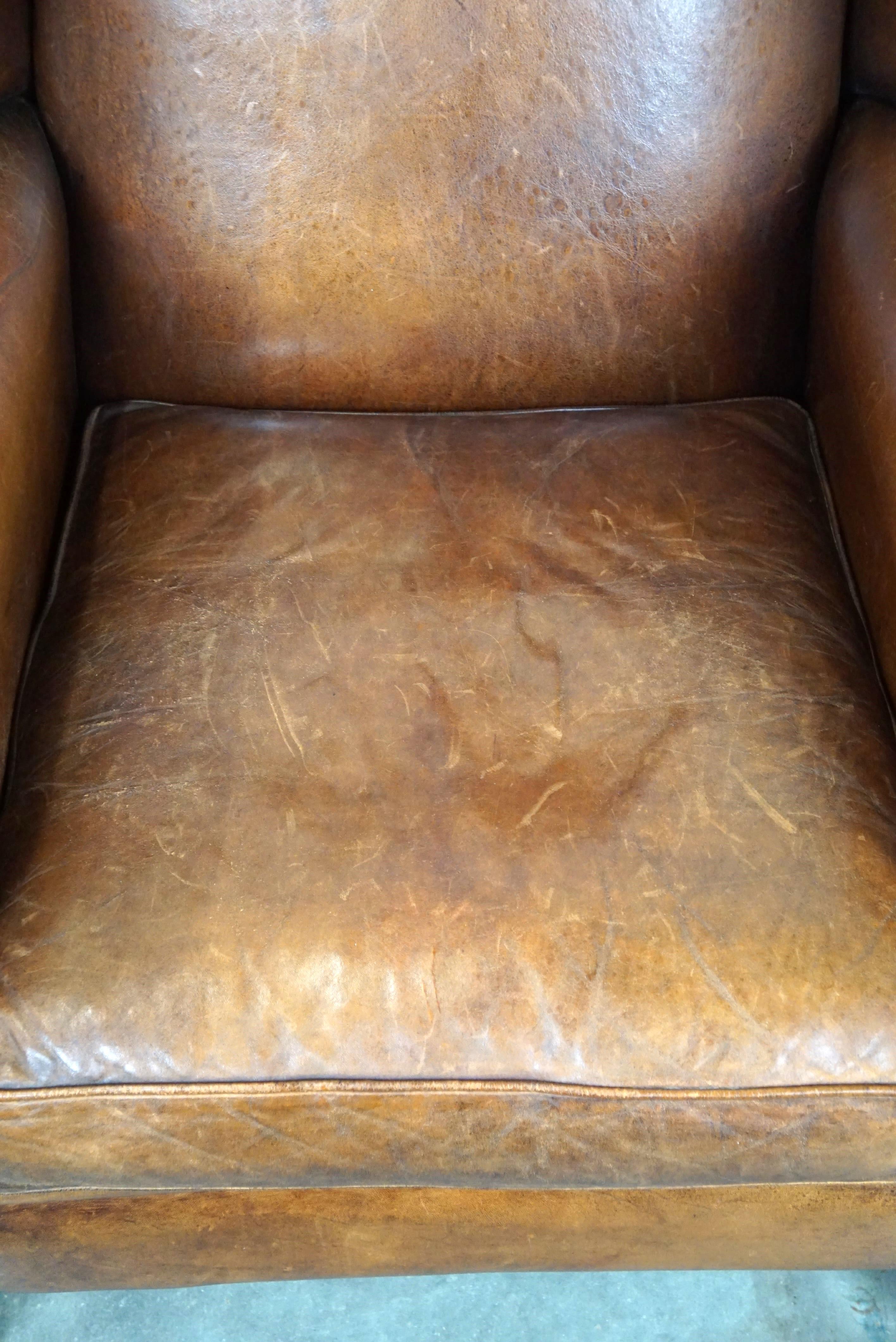 Bellissima e particolarmente confortevole sedia wingback in pelle di pecora in vendita 1