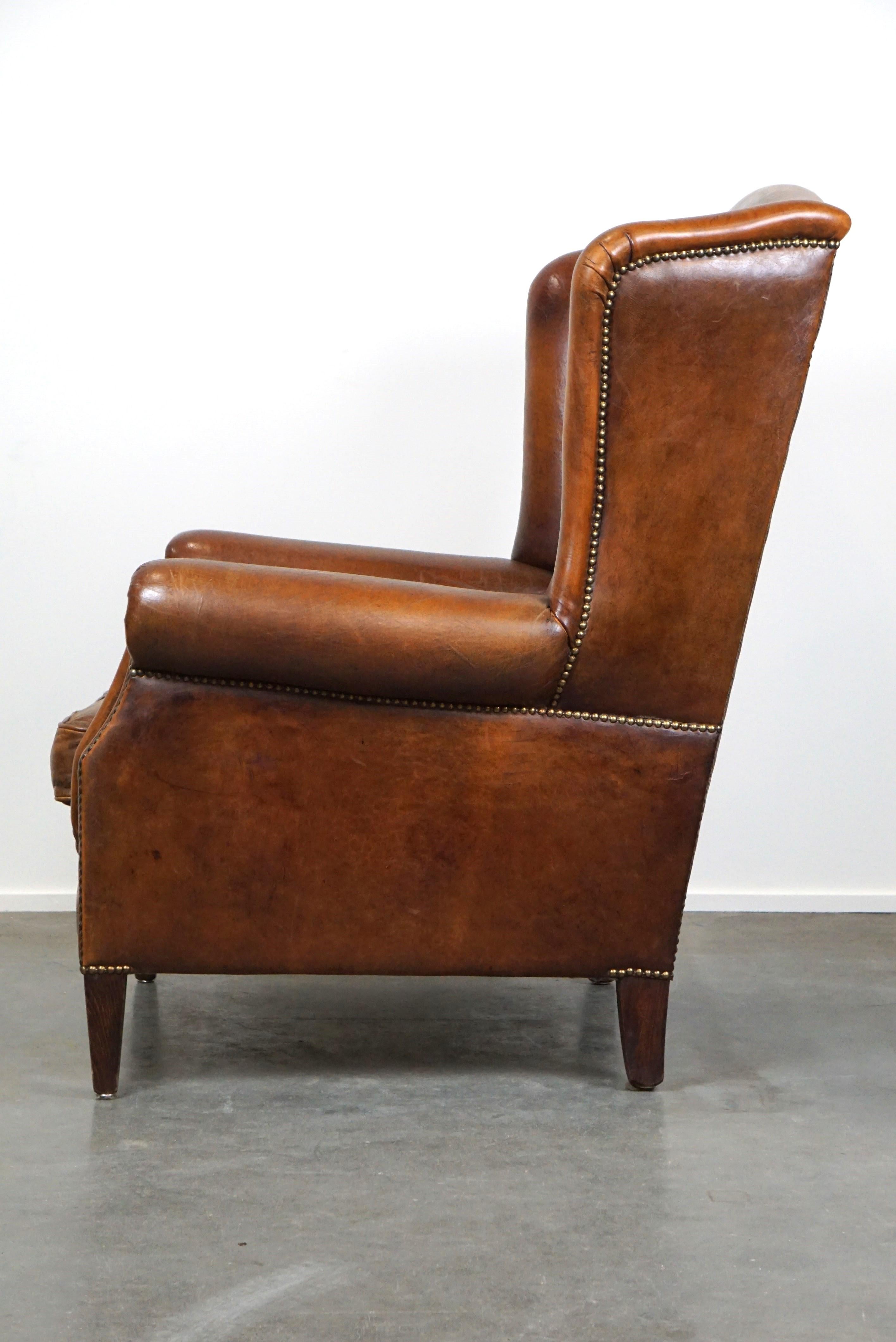 Pelle Bellissima e particolarmente confortevole sedia wingback in pelle di pecora in vendita
