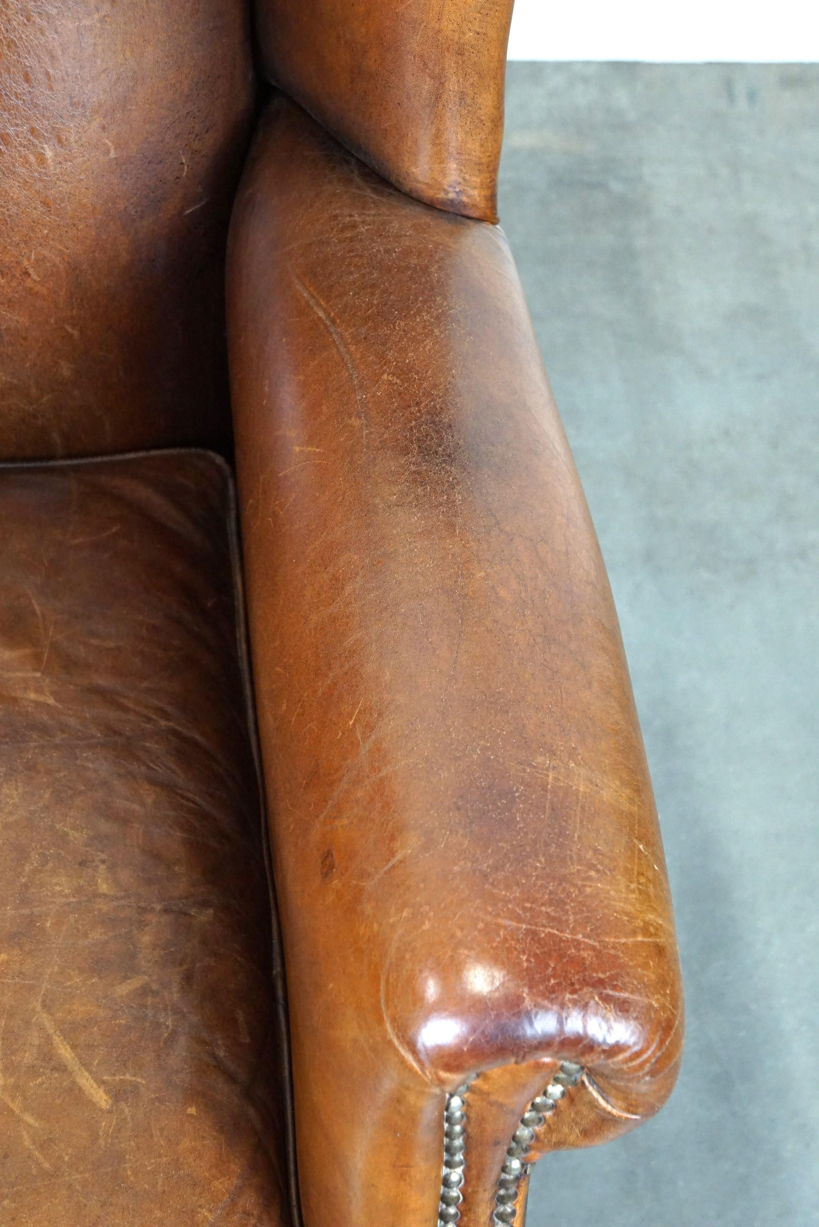 Bellissima e particolarmente confortevole sedia wingback in pelle di pecora in vendita 3