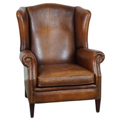 Beautiful and especially comfortable wingback chair made of sheepskin leather